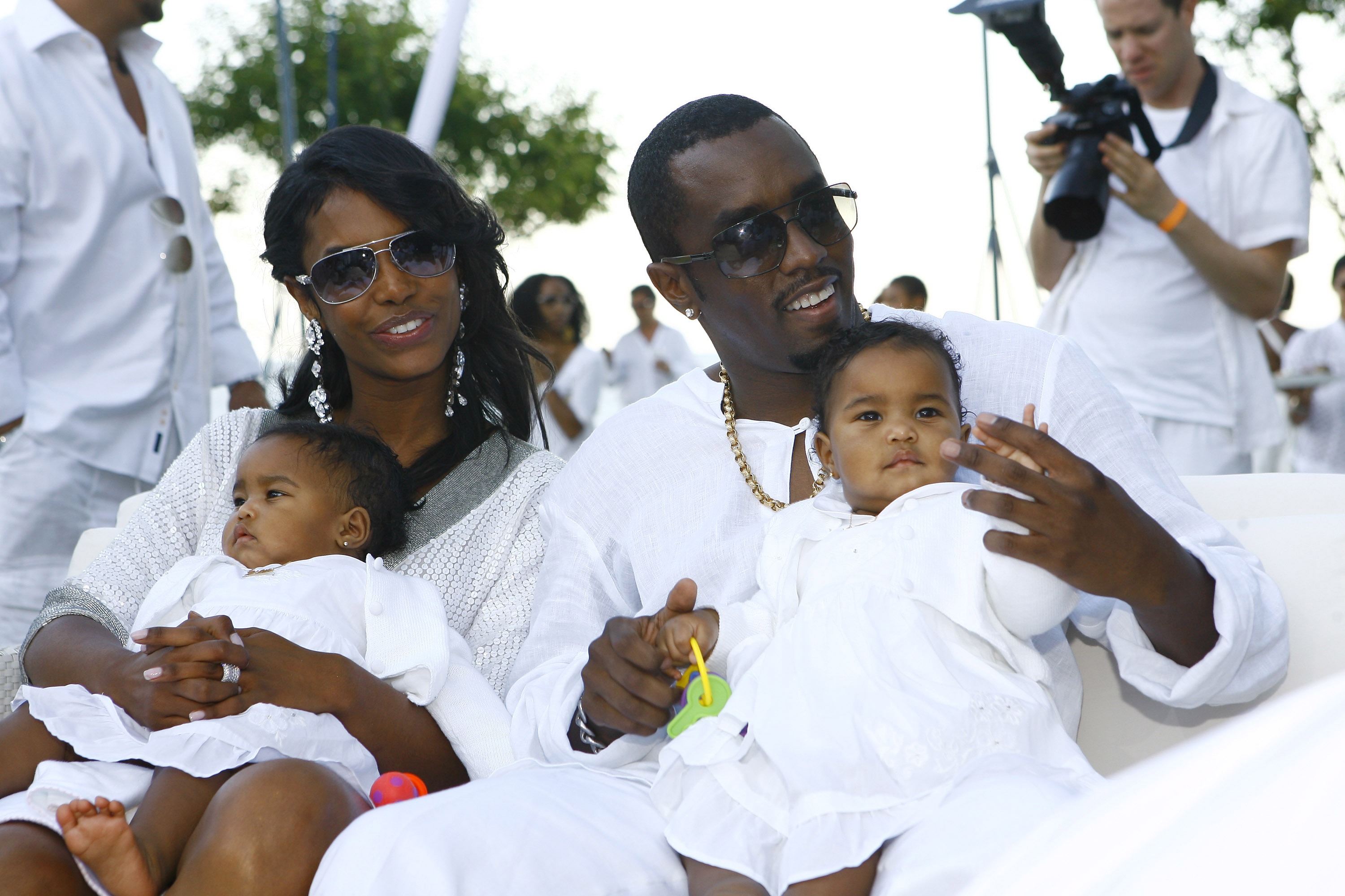 Kim Porter and Sean "Diddy" Combs with their twin daughters D'Lila and Jessie on September 2, 2007 | Source: Getty Images