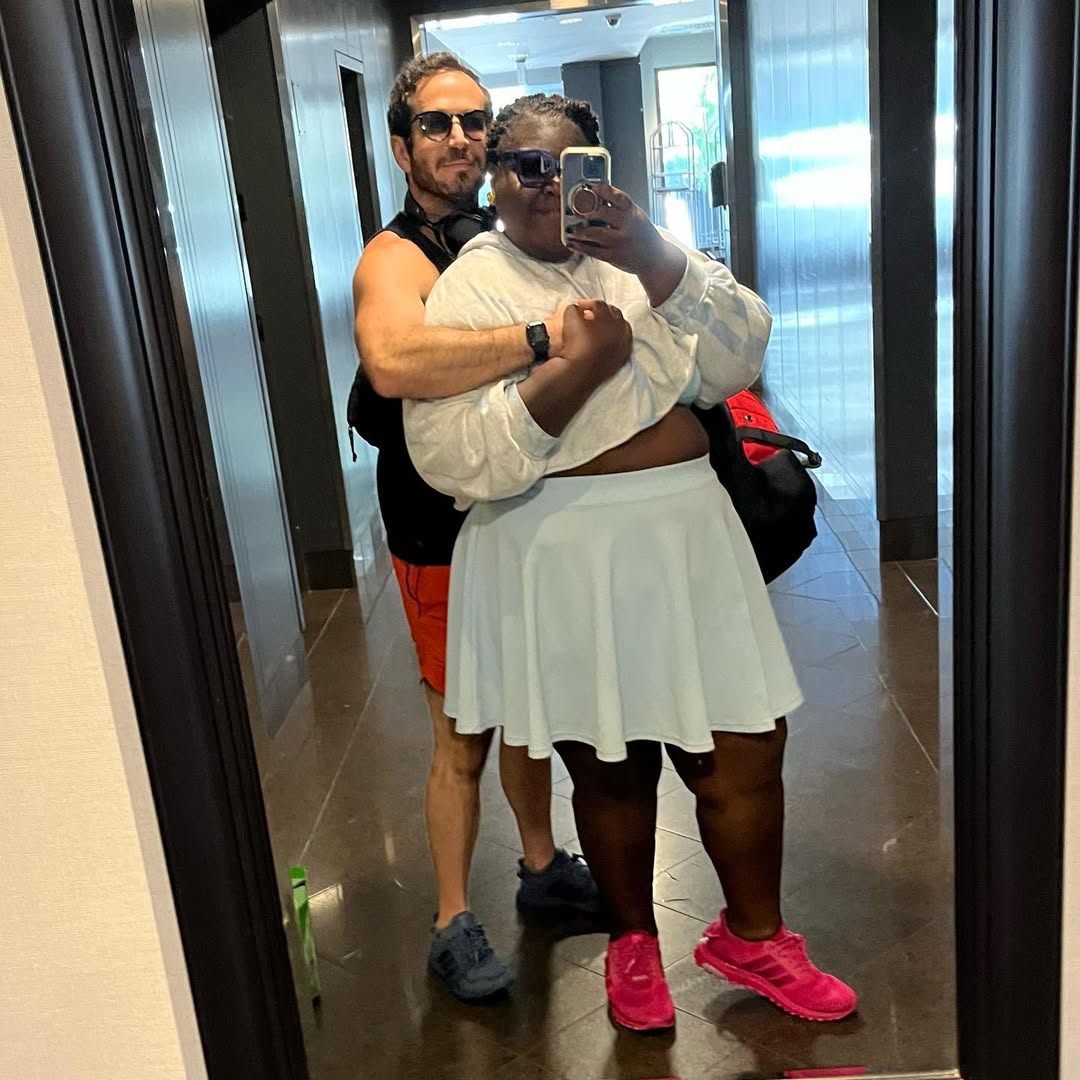 Gabourey Sidibe and her partner from a post dated August 18, 2022. | Source: Instagram/gabbysidibe