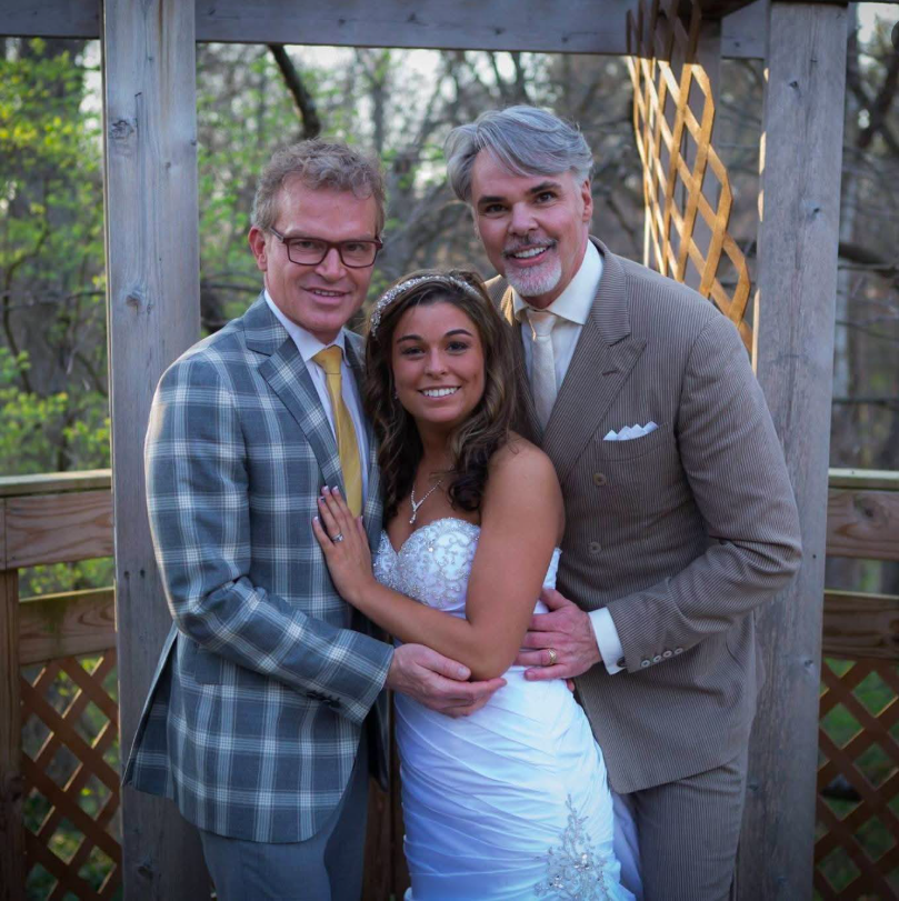 Joanna Elswick posing for a photo on her wedding day with Christopher Jon Hopkins and another loved one. | Source: Facebook/Joanna Elswick
