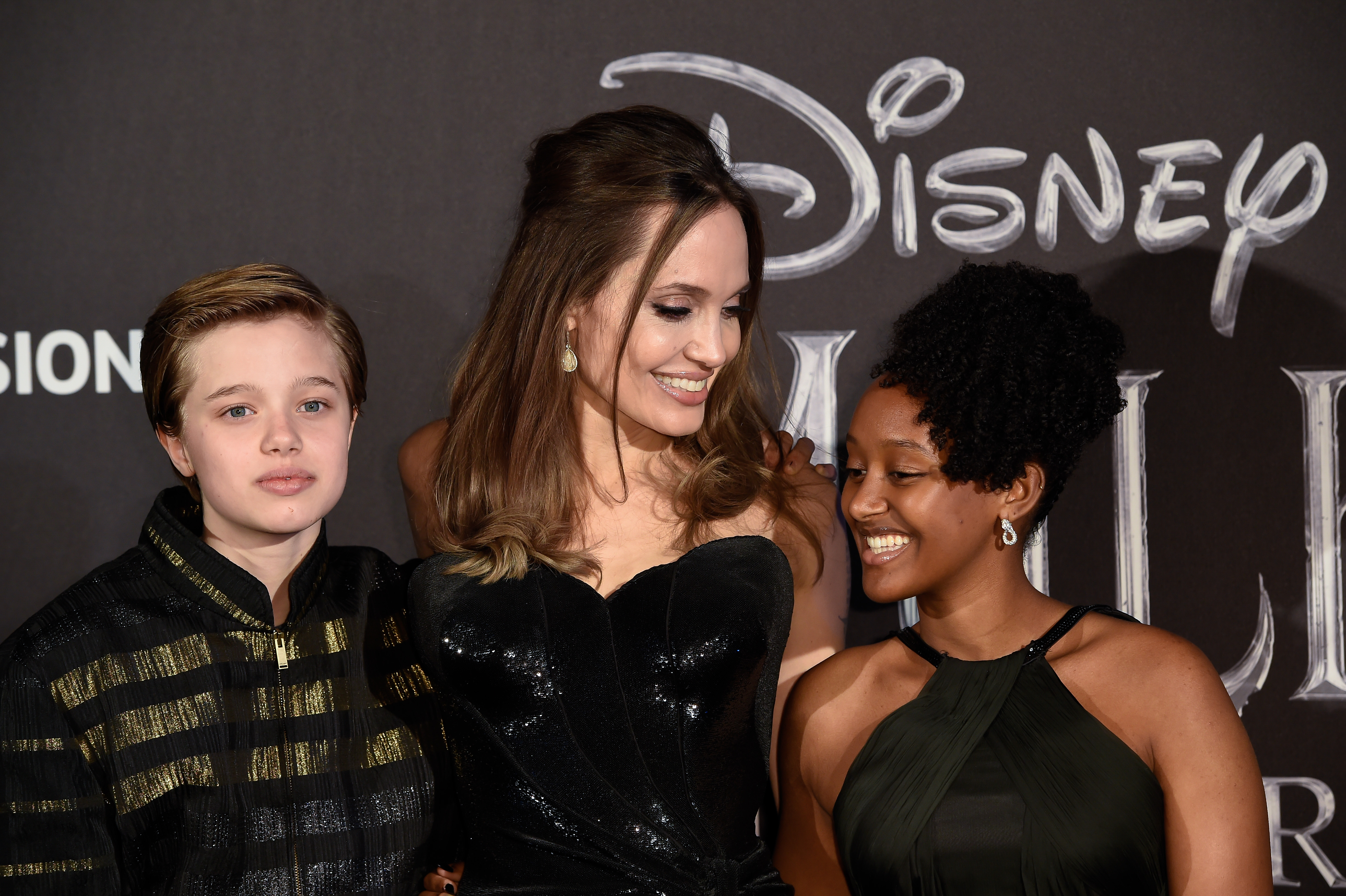 Shiloh Nouvel Jolie-Pitt, Angelina Jolie, and Zahara Marley Jolie-Pitt during the European premiere of "Maleficent: Lady of Evil" in Rome on October 7, 2019 | Source: Getty Images