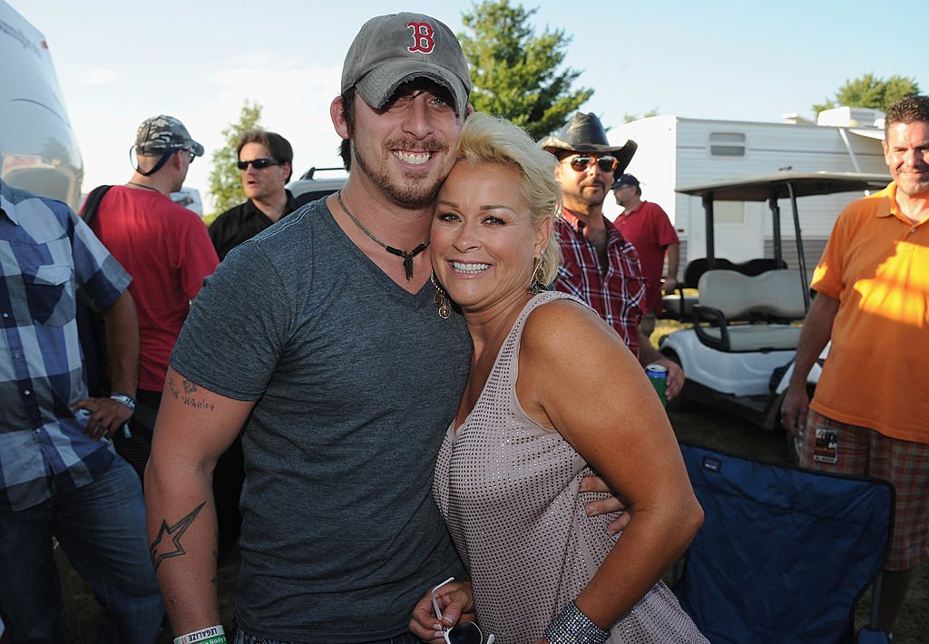 Lorrie Morgan and son Jesse Keith Whitley backstage at the Country Thunder Music Festival, July 2011 | Source: Getty Images