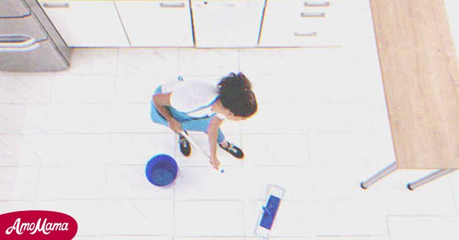 Woman cleaning floor | Source: Shutterstock