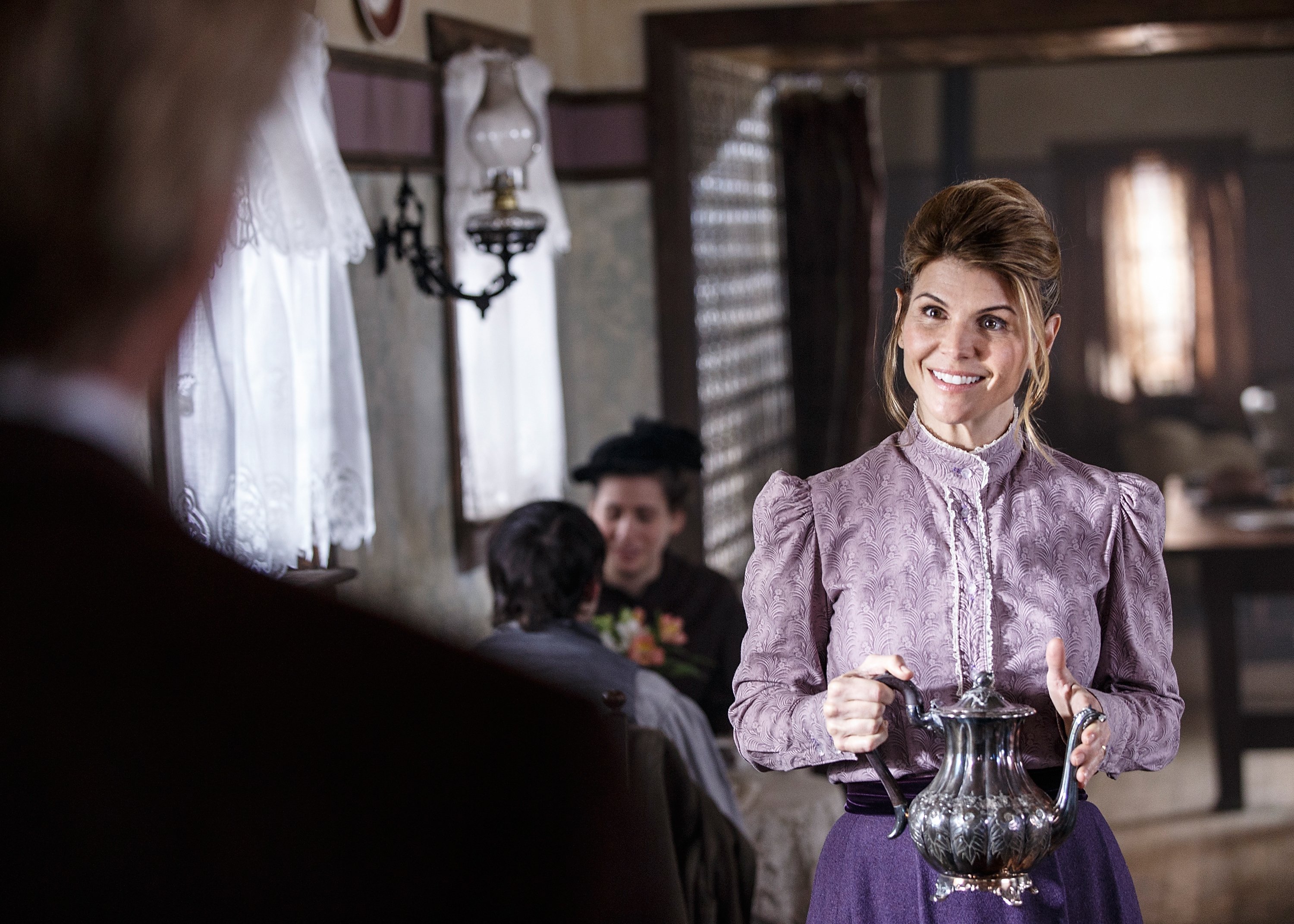 Lori Loughlin filming a scene for TV series, "When Calls the Heart" in Vancouver, Canada on February 20, 2014, | Photo: Getty Images