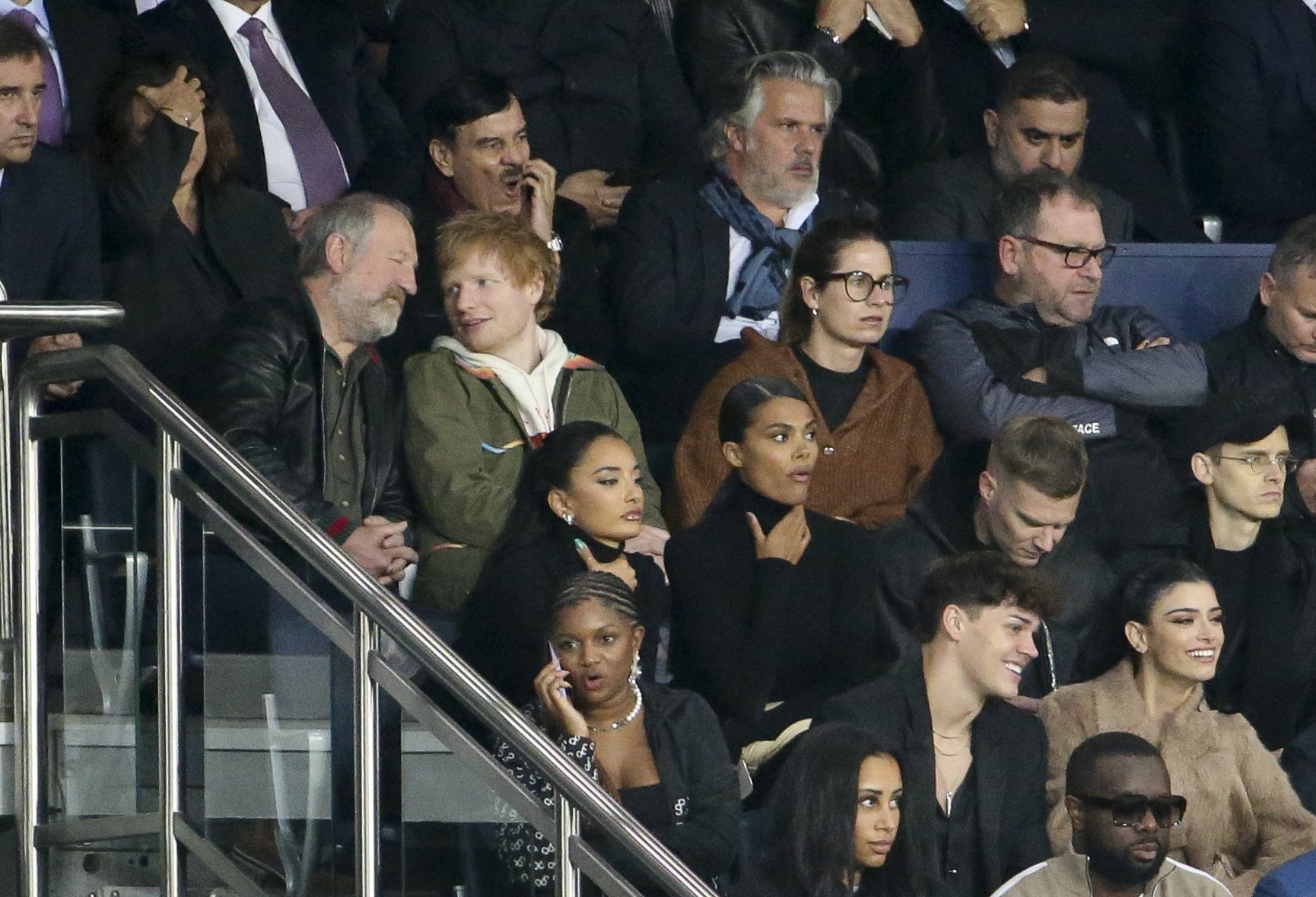 John Sheeran, Ed Sheeran, and Cherry Seaborn, at a UEFA Champions League match between Paris Saint-Germain and Manchester City, at Parc des Princes stadium, in Paris, France, on September 28, 2021. | Source: Getty Images