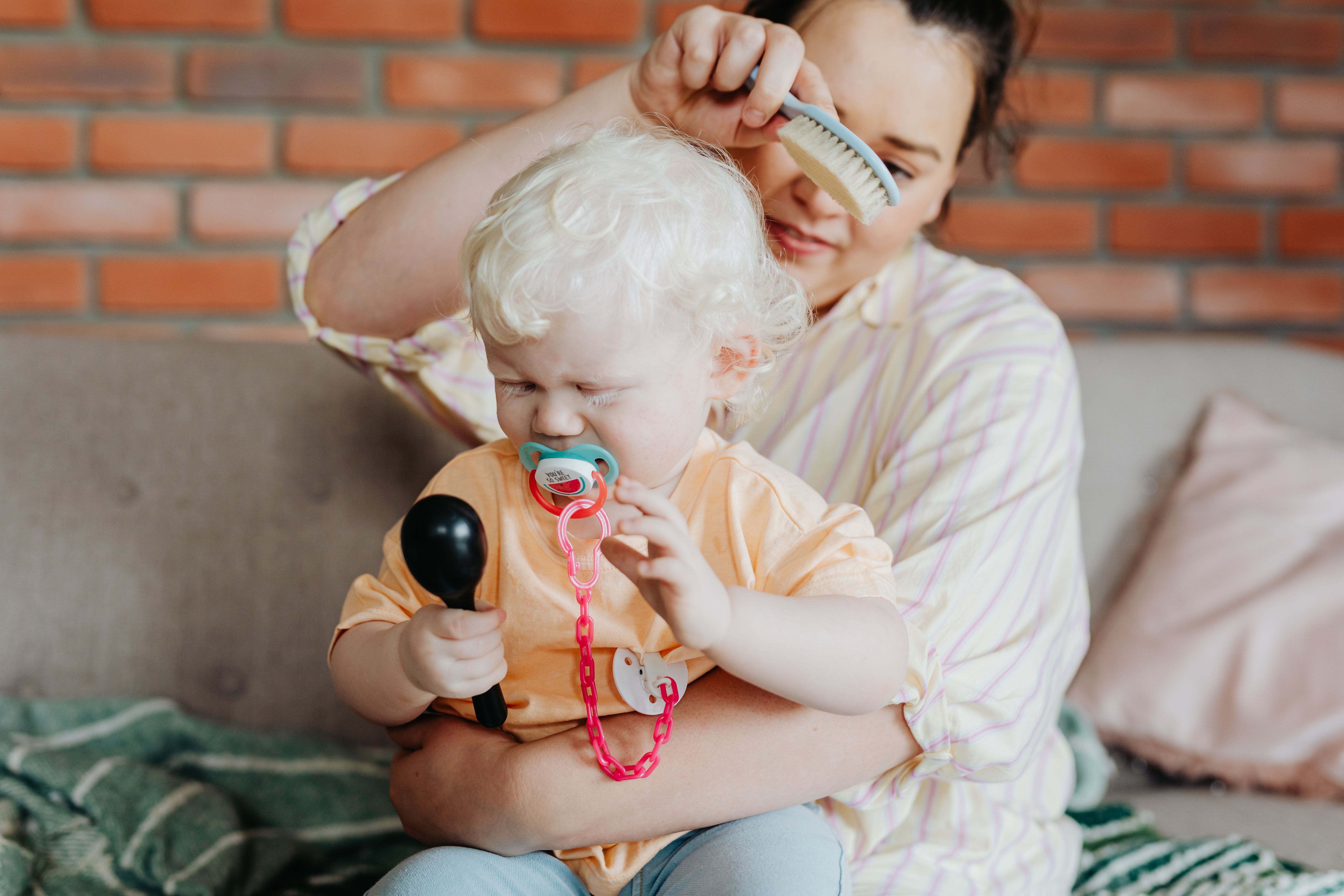 Mom caring for her child | Source: Pexels