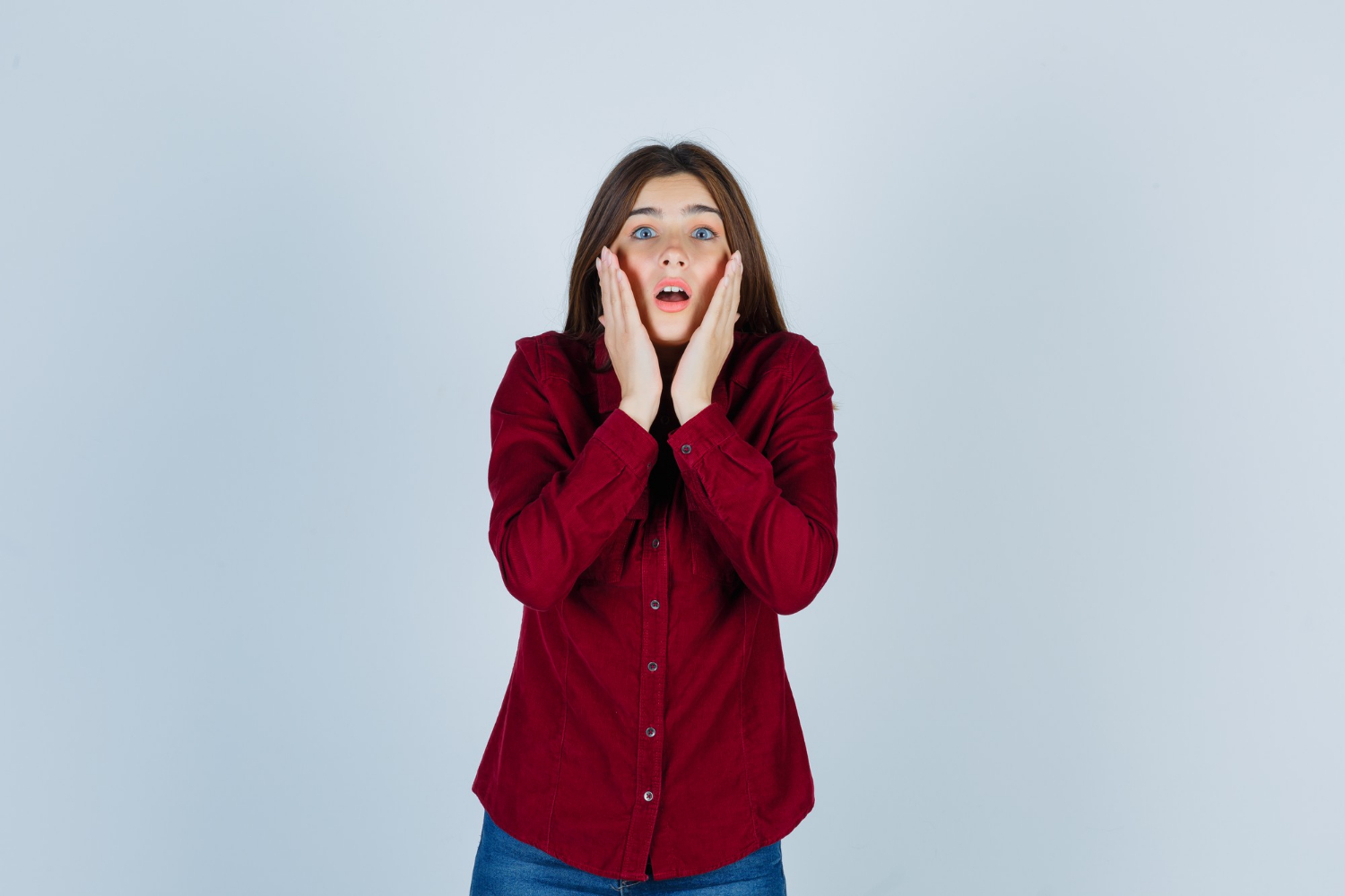 A shocked woman | Source: Freepik