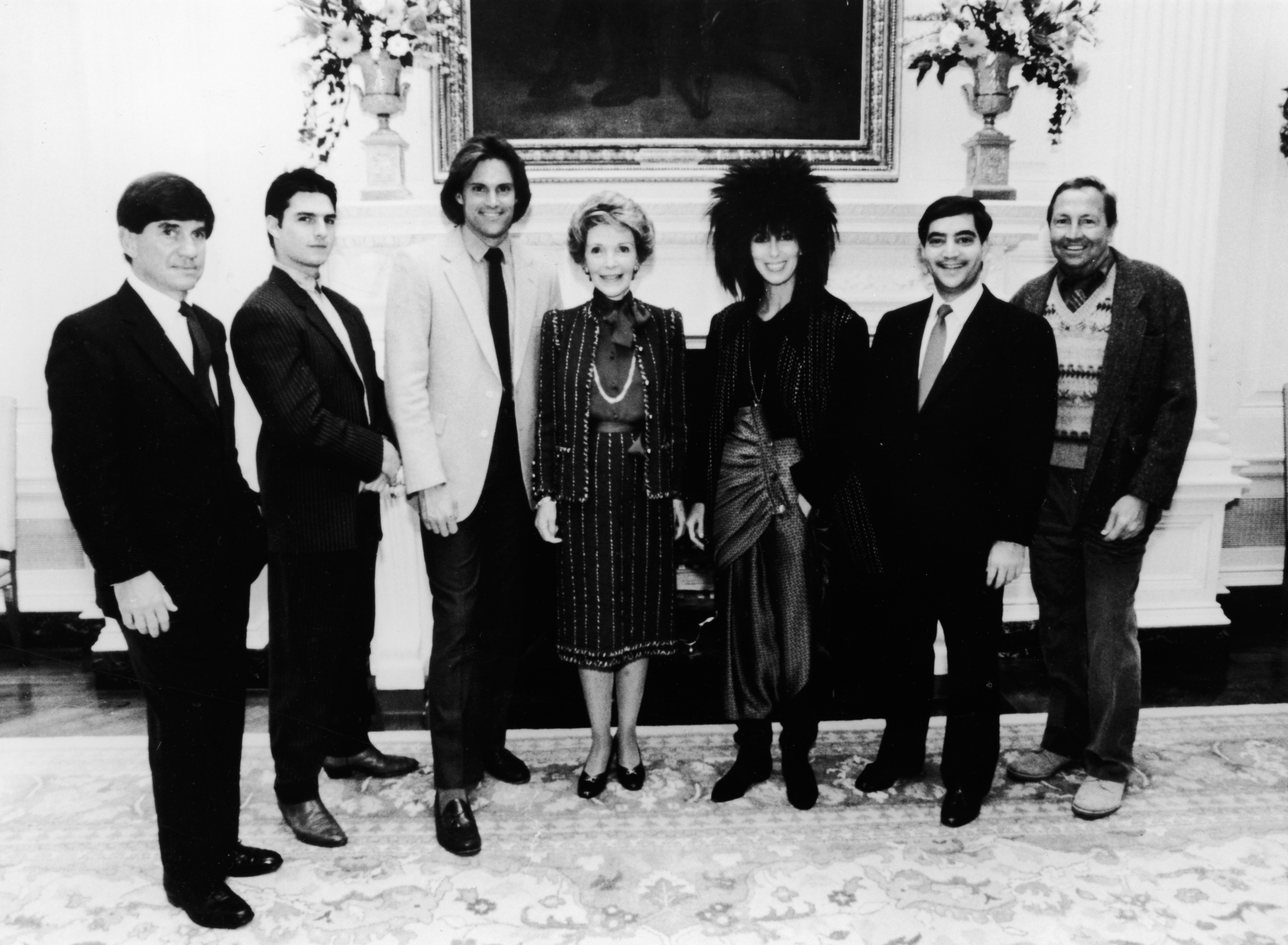 (L- R): G. Chris Anderson, Tom Cruise, Bruce Jenner, First Lady Nancy Reagan, Cher, Richard C. Strauss, and Robert Rauchenberg, at the White House on October 1, 1985 in Washington, DC | Source: Getty Images