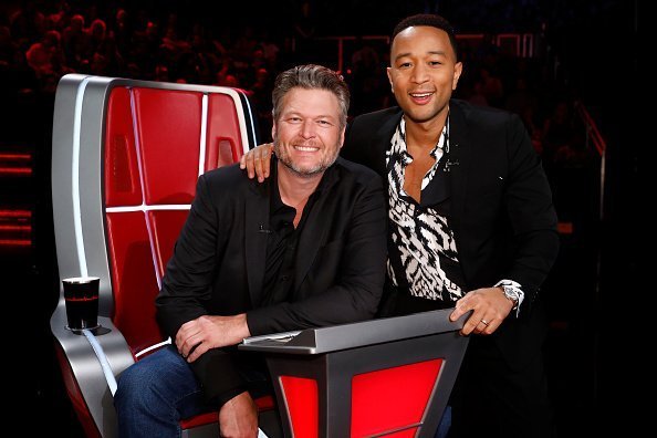 Blake Shelton and John Legend posing for a photo on the set of The Voice | Photo: Getty Images