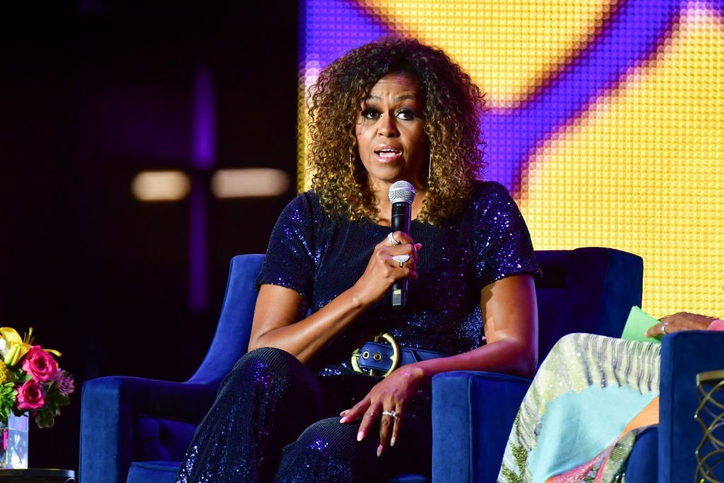 A conversation with Michelle Obama takes place during the 2019 ESSENCE Festival at the Mercedes-Benz Superdome | Photo: Getty Images