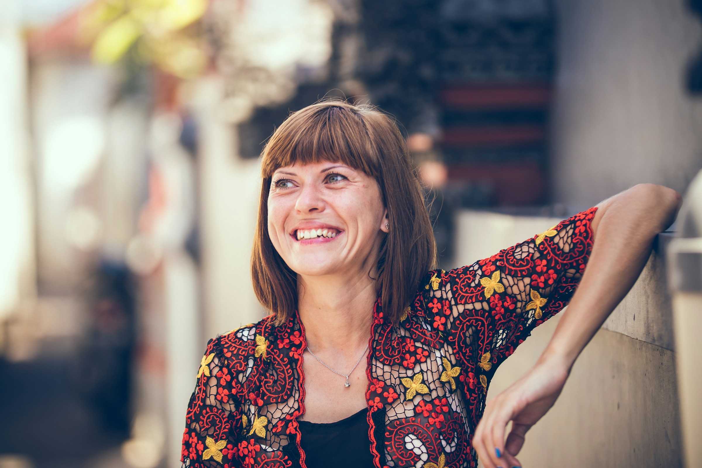 A smiling older woman | Source: Unsplash