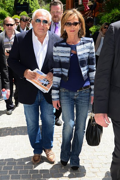 Dominique Strauss Kahn et Myriam L'Aouffir assistent à l'Open de Roland Garros 2015 - Jour 7, le 30 mai 2015 à Paris, France. | Photo : Getty Images