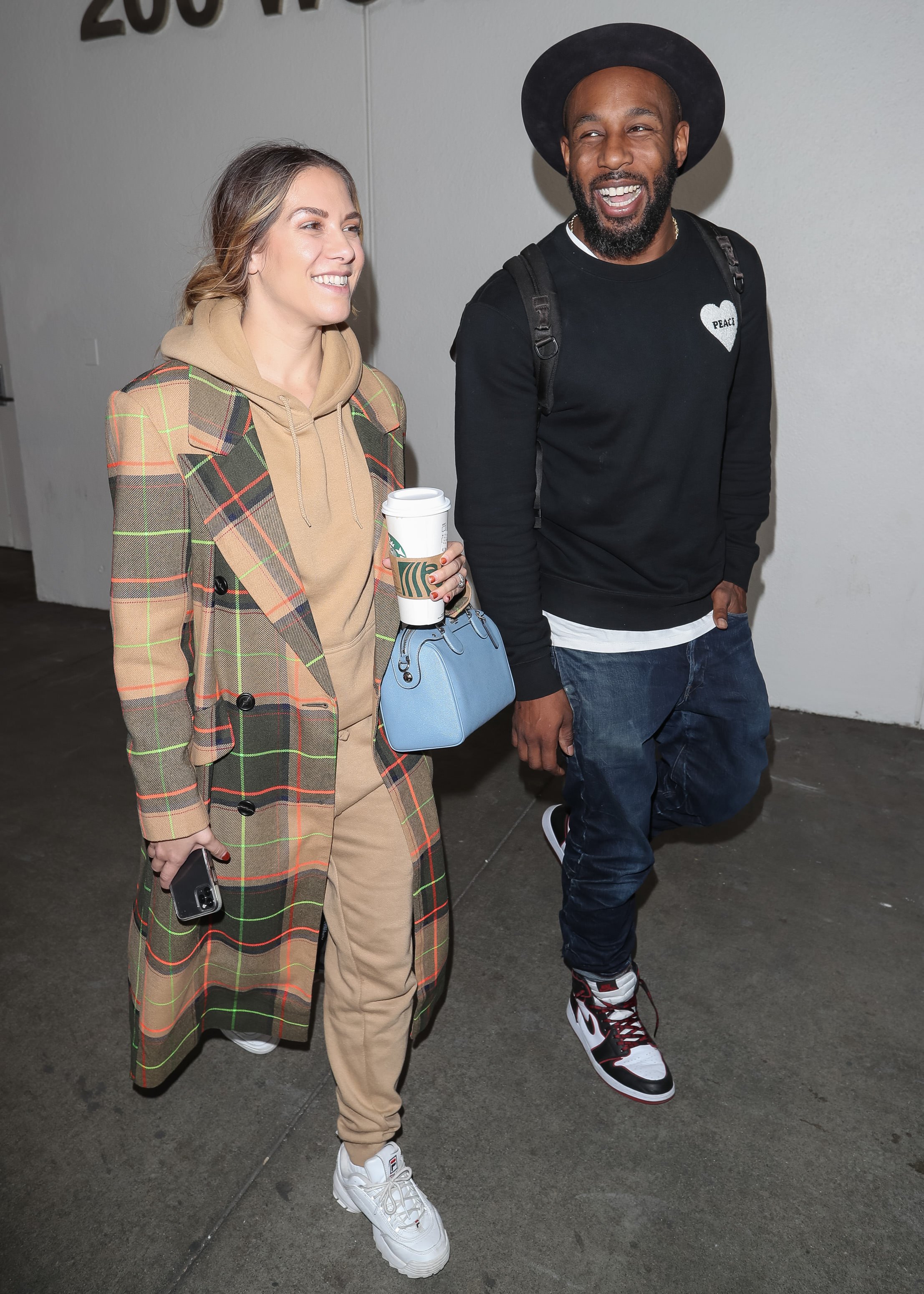 Allison Holker and Stephen "tWitch" Boss seen at LAX on February 12, 2020, in Los Angeles, California | Source: Getty Images