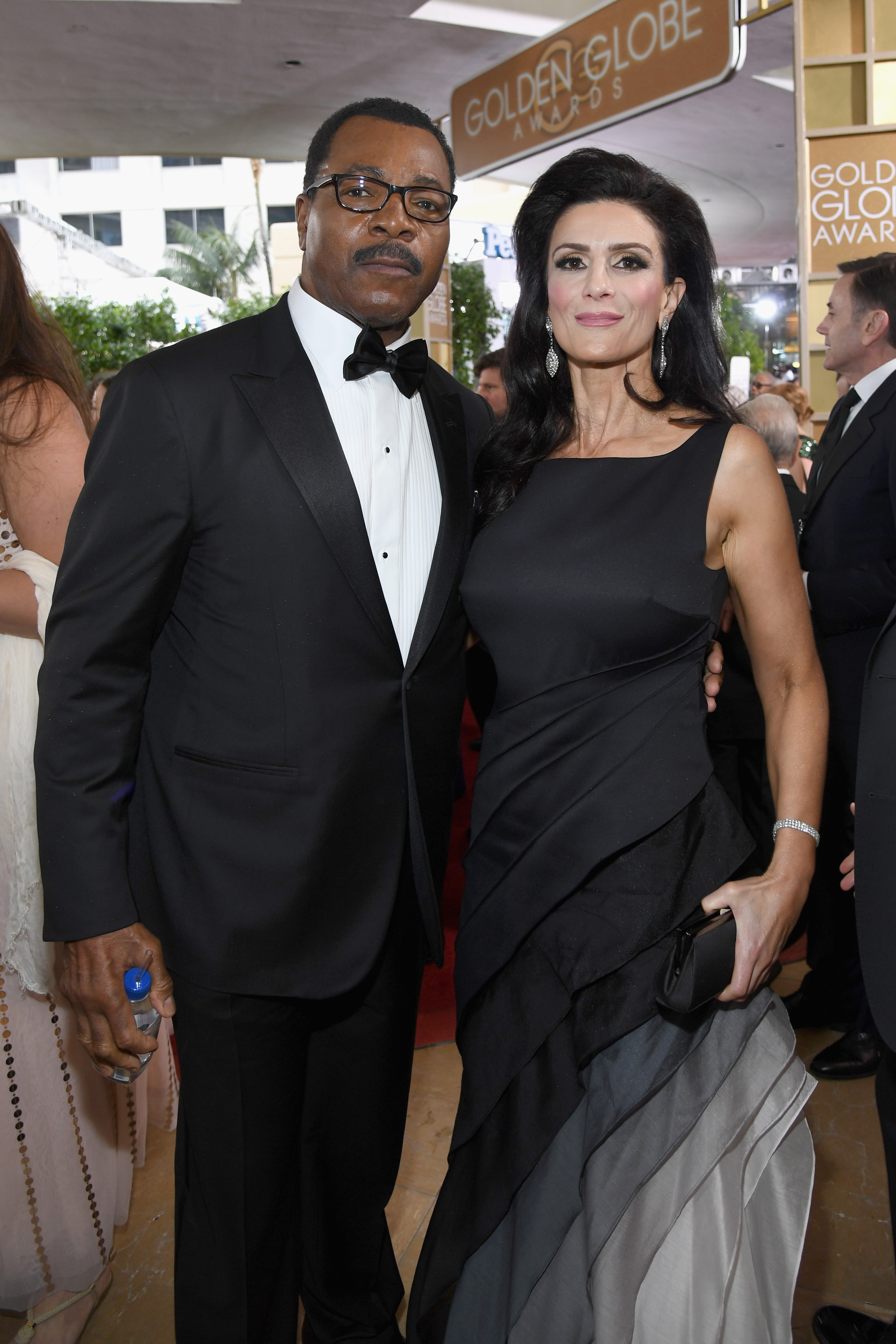 Actors Carl Weathers (L) and Christine Kludjian at the 74th annual Golden Globe Awards sponsored by FIJI Water at The Beverly Hilton Hotel on January 8, 2017 in Beverly Hills, California | Source: Getty Images