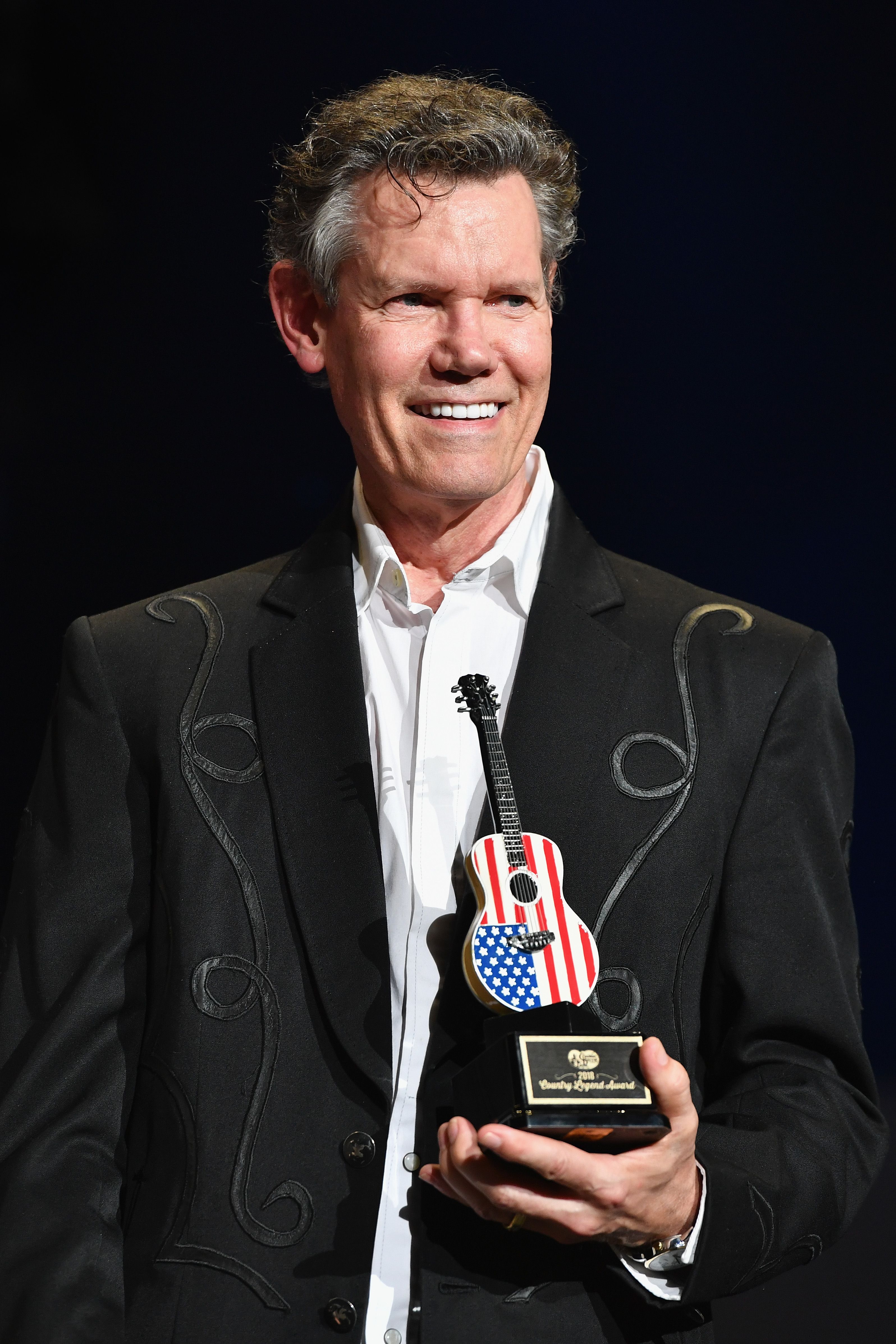 Randy Travis receives an award during the CMA Music Festival on June 9, 2018, in Nashville | Photo: Erika Goldring/Getty Images