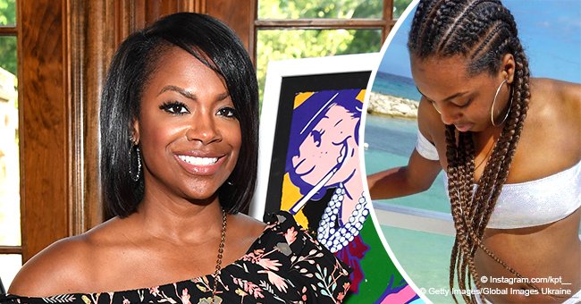 Kandi Burruss' step-daughter turns up the heat in white bikini during holiday vacation