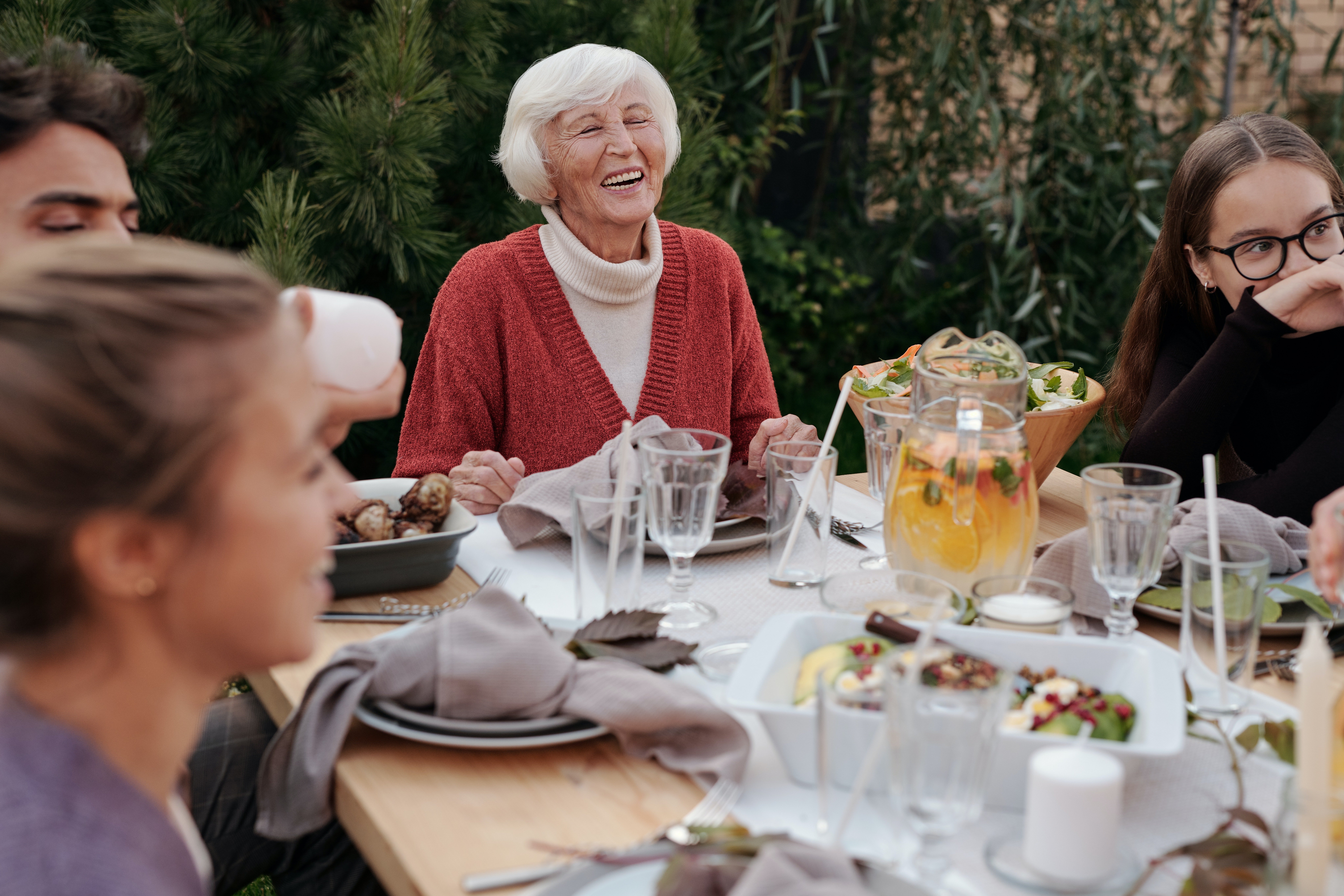 Couple at a weekend dinner with grandma | Photo: Pexels/askar-abayev