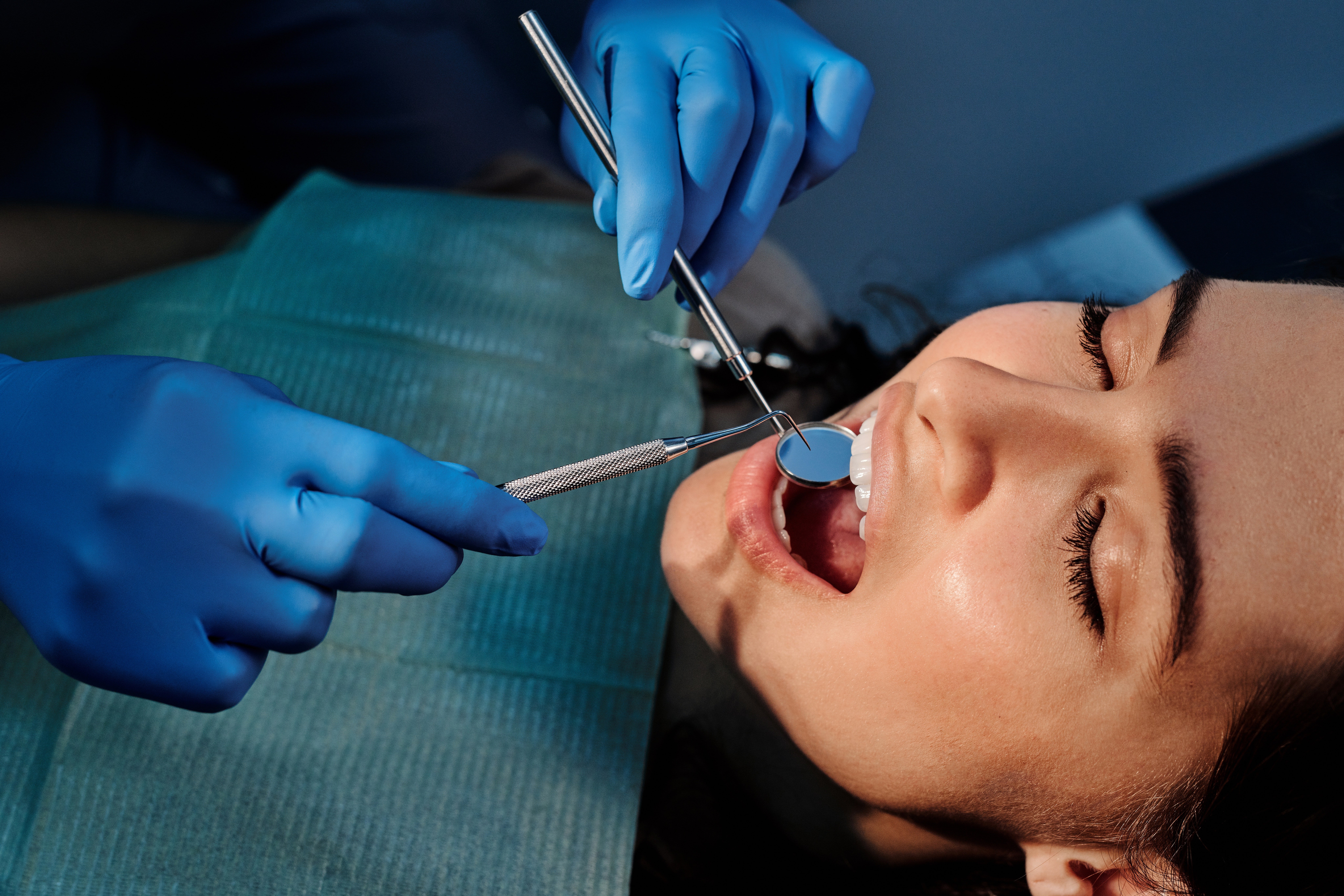 A woman undergoing a dental procedure. | Photo: Shutterstock