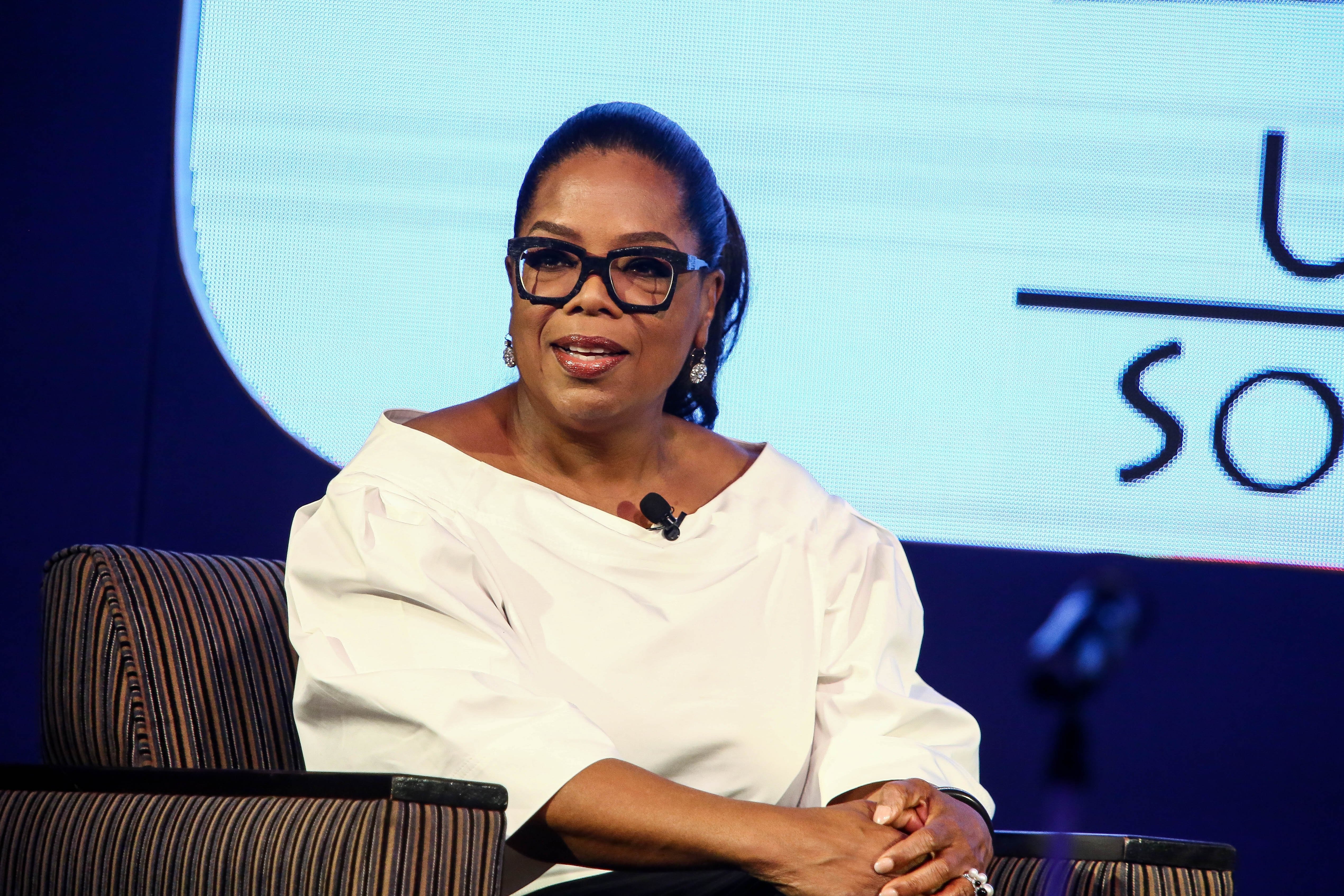  American talkshow host Oprah Winfrey speaks during a Dreams programme event at the Premier Hotel in OR Tambo Airport on December 02, 2016 in Johannesburg, South Africa. | Source: Getty Images