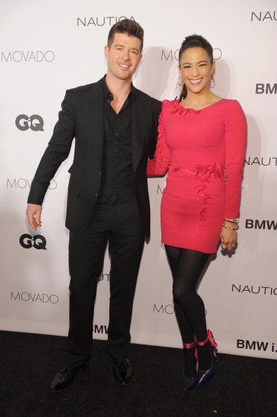 Robin Thicke and actress Paula Patton walk the red carpet at the 2013 GQ Gentlemen's Ball presented by BMW i, Movado, and Nautica at IAC Building on October 23, 2013, in New York City. | Source: Getty Images.