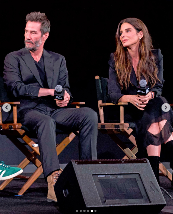 Keanu Reeves and Sandra Bullock on stage for a Q&A session as part of Beyond Fest, posted on October 9, 2024 | Source: Instagram.com/entertainmenttonight