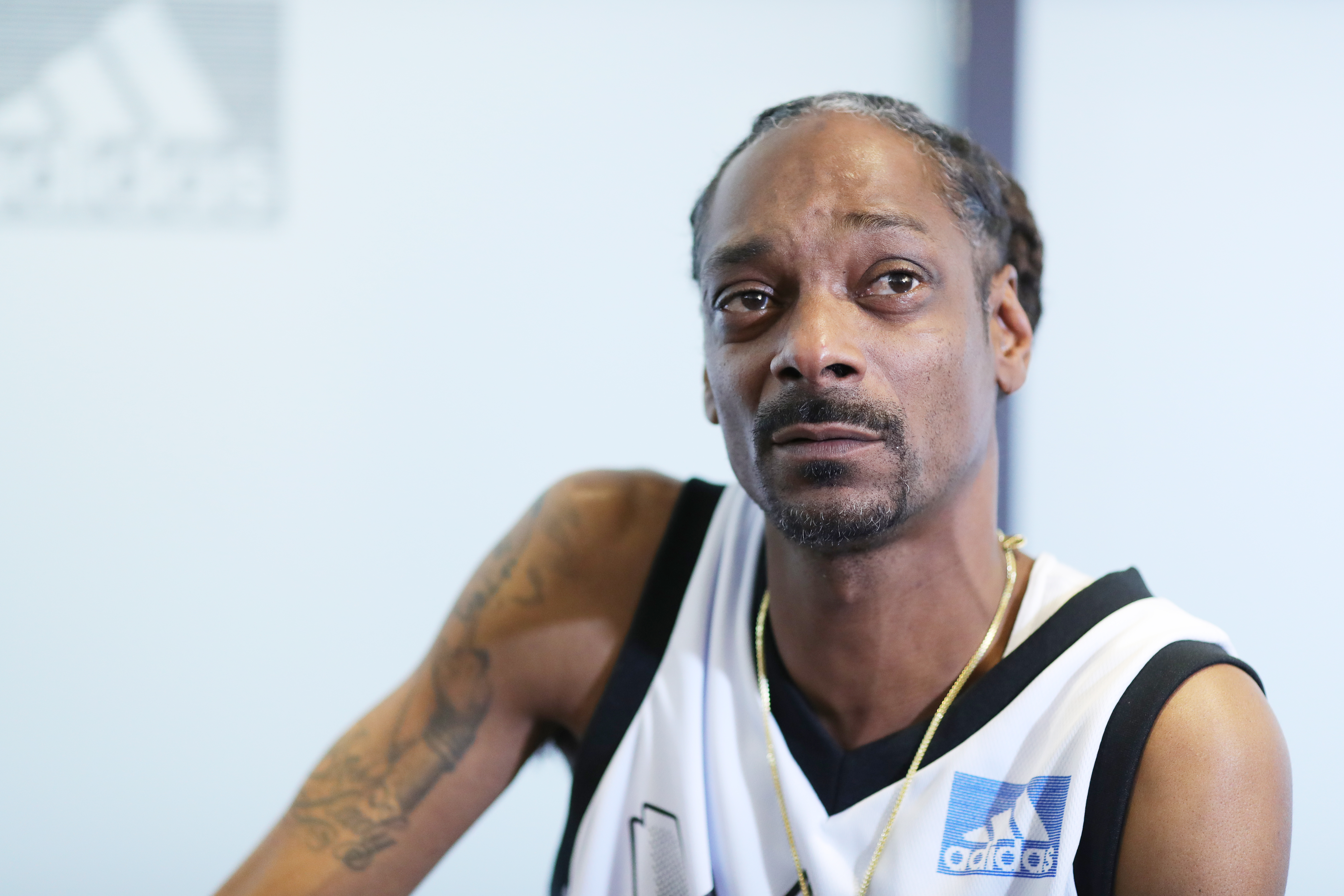 Snoop Dogg speaks during a press conference at Adidas Creates 747 Warehouse St., an event in basketball culture, in Los Angeles, California, on February 16, 2018. | Source: Getty Images
