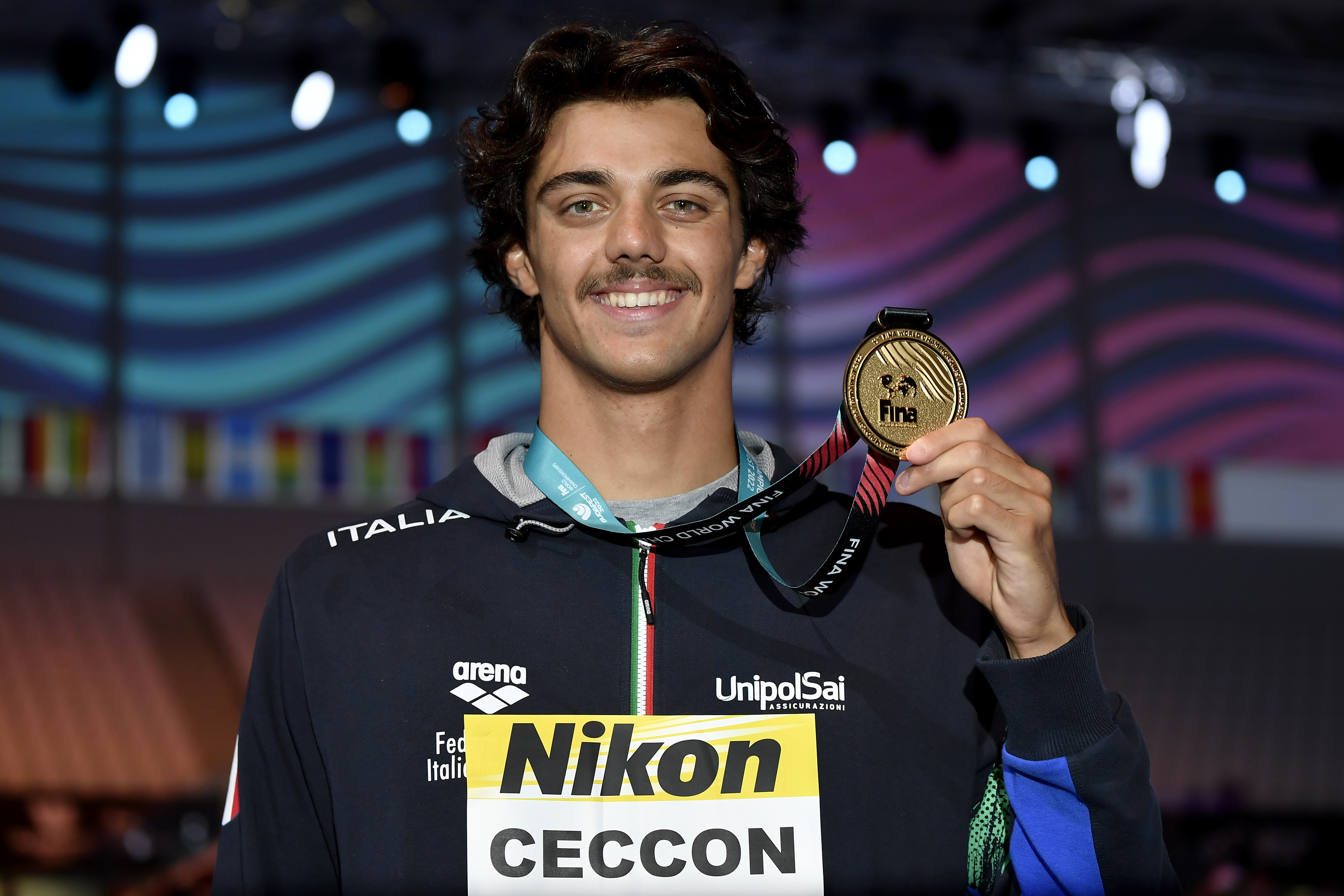 Thomas Ceccon posing for a picture with his medal after competing in the 100m Freestyle Men Final during the FINA 19th World Championships in Budapest, Hungary on June 20, 2022 | Source: Getty Images