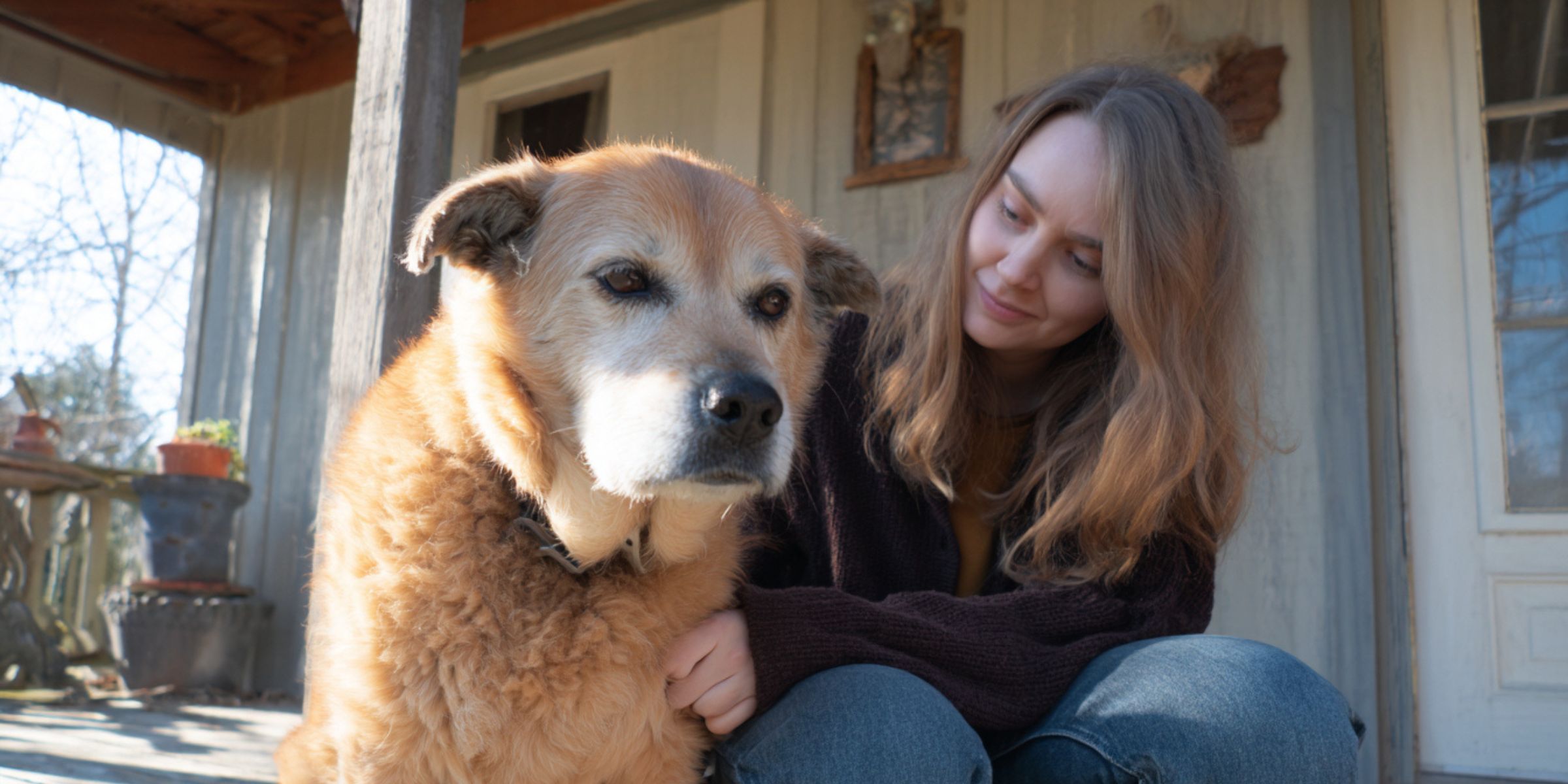 A woman and her dog | Source: Amomama