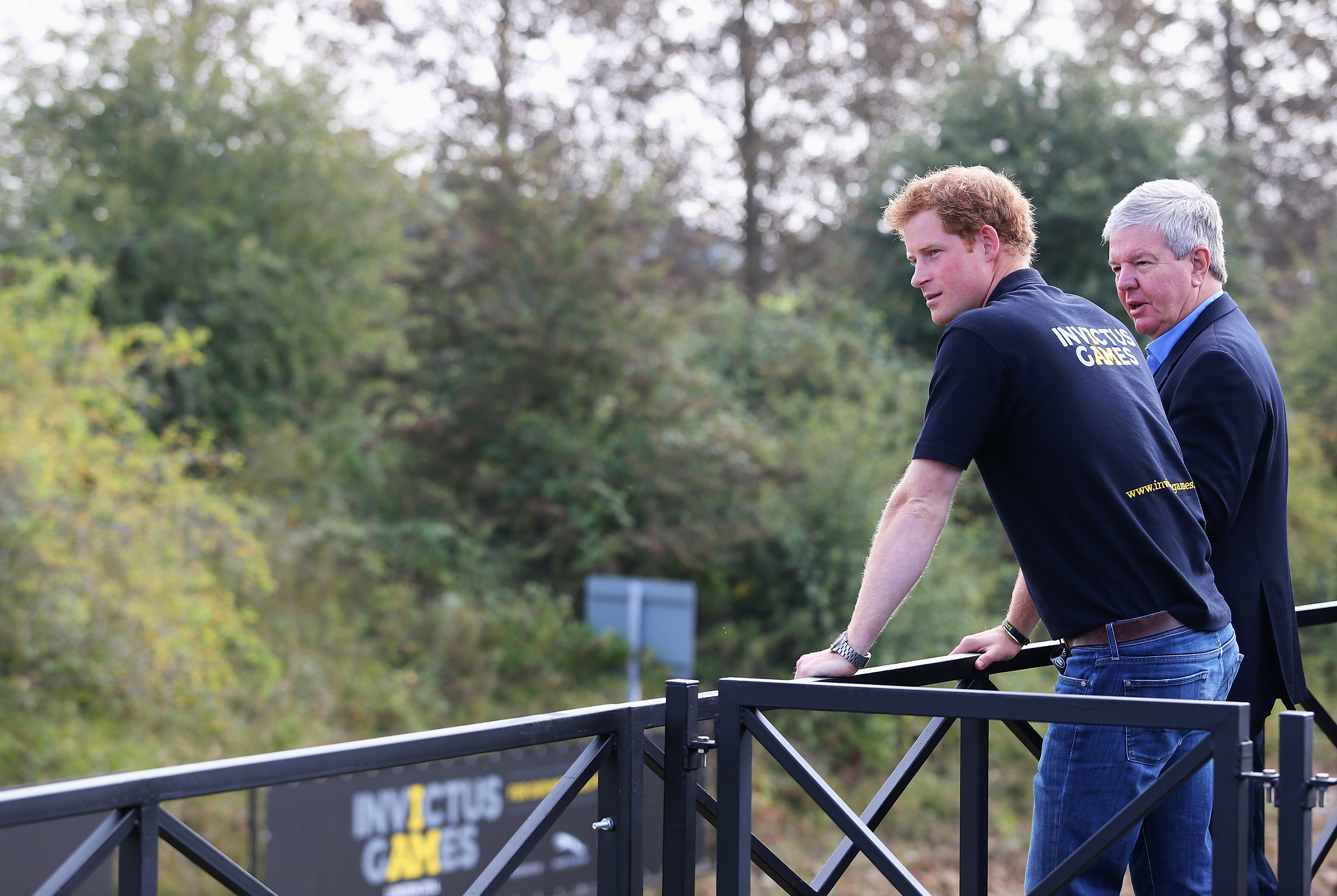 Prince Harry and Sir Keith Mills at Jaguar Land Rover Engineering Centre in Gaydon, England on September 9, 2014. | Source: Getty Images