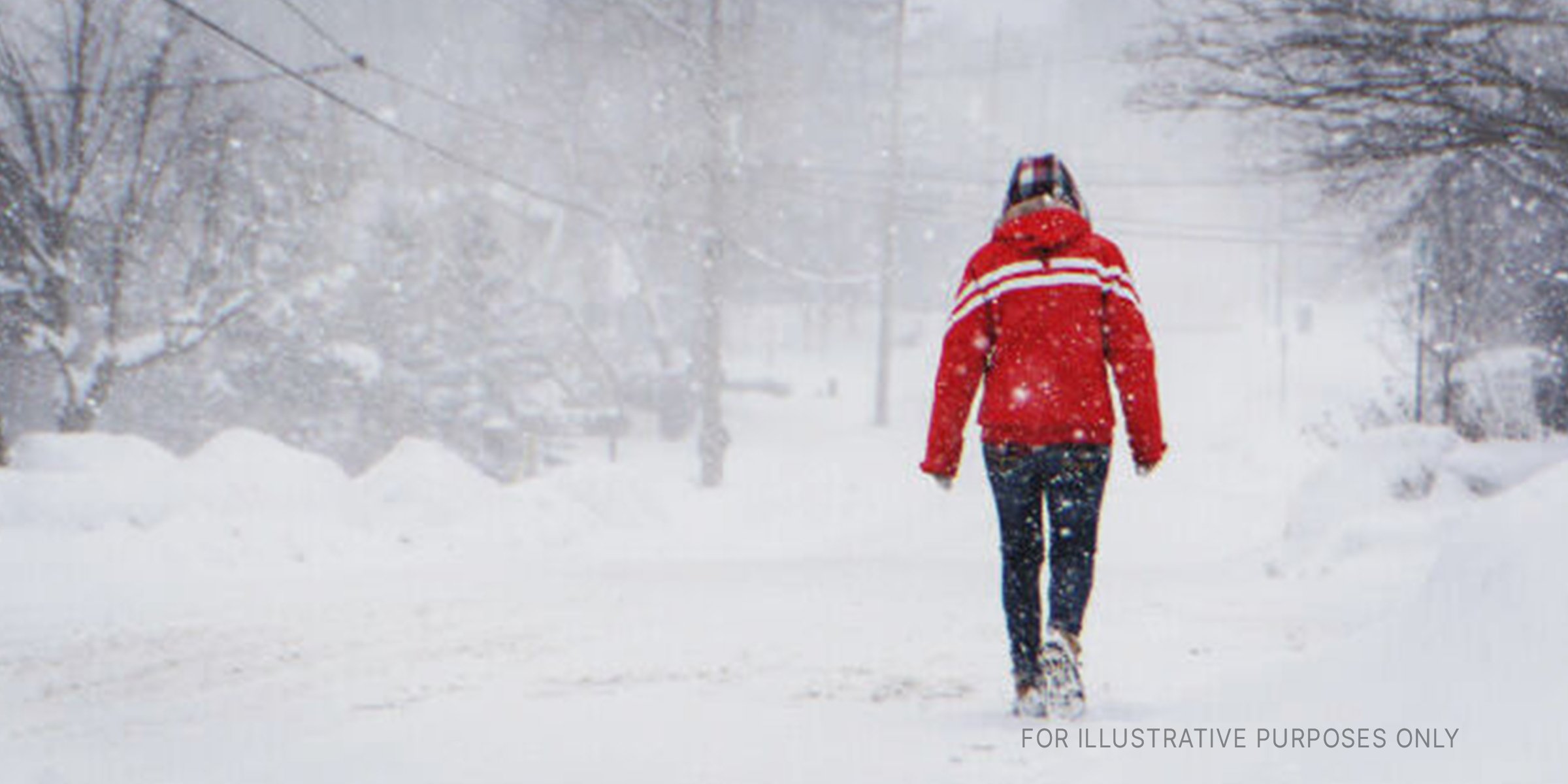 Woman walking on snow | Source: Getty Images