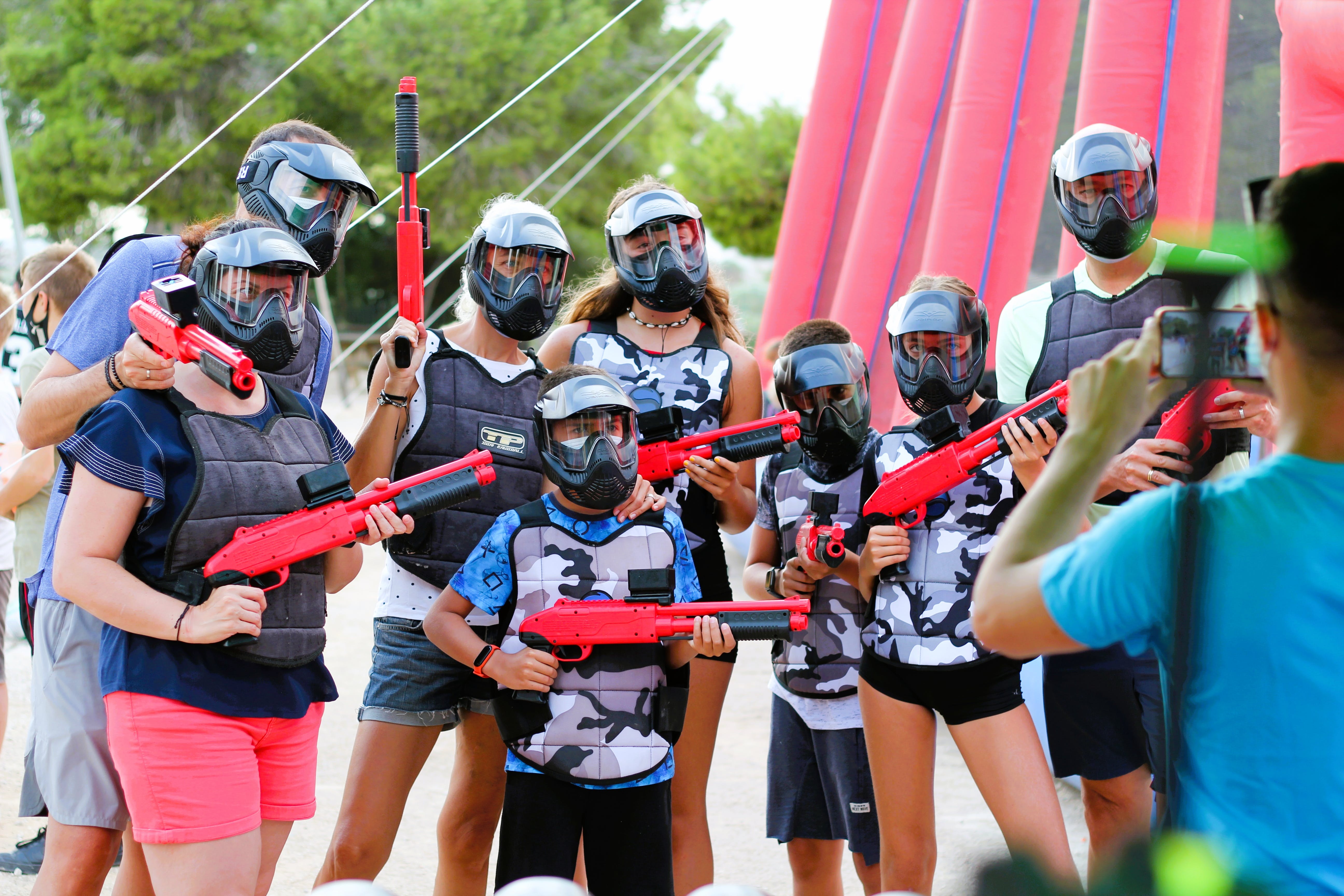 A photo of people playing paintball. | Source: Pexels