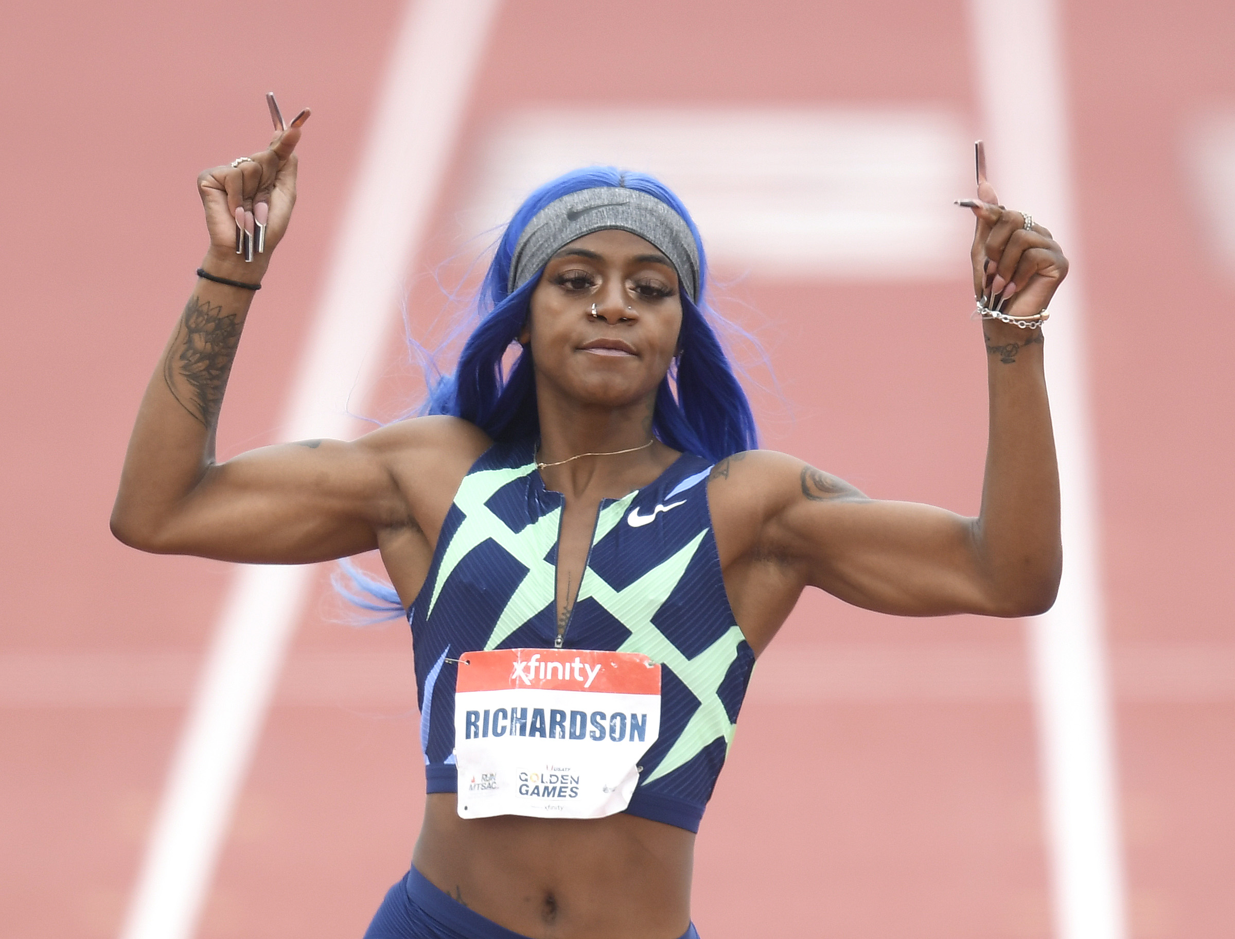 Sha'Carri Richardson reacts as she crosses the finish in her win in the Women 100 Meter Dash Prelims during the USATF Golden Games and World Athletics Continental Tour event on May 9, 2021, in Walnut, California. | Source: Getty Images