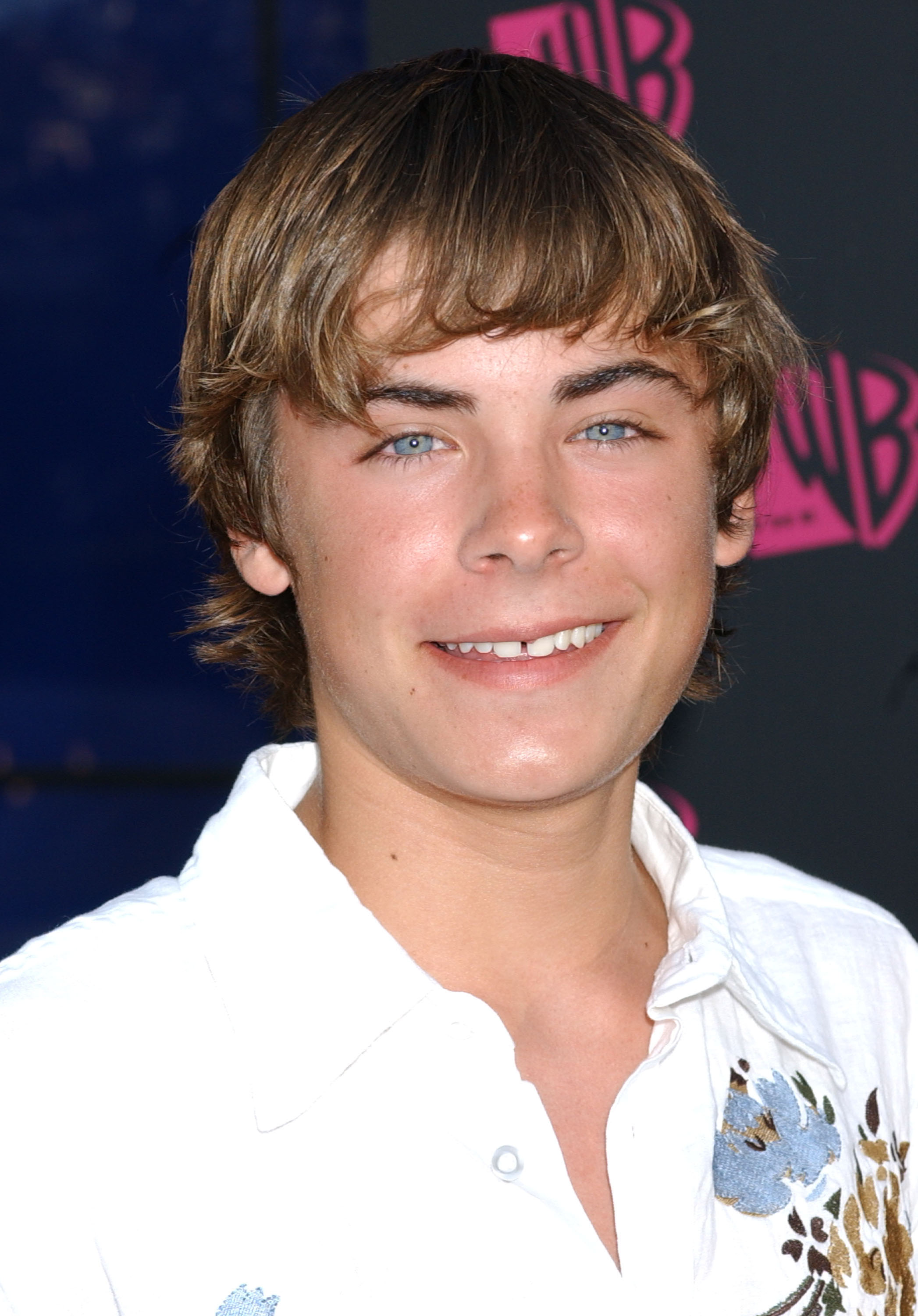With shaggy blond-brown hair, bright blue eyes, and a white embroidered shirt, Efron was the definition of early 2000s teen charm in 2004. Just before his breakout in "High School Musical," he was already making waves as a rising Disney star with matinee idol potential.