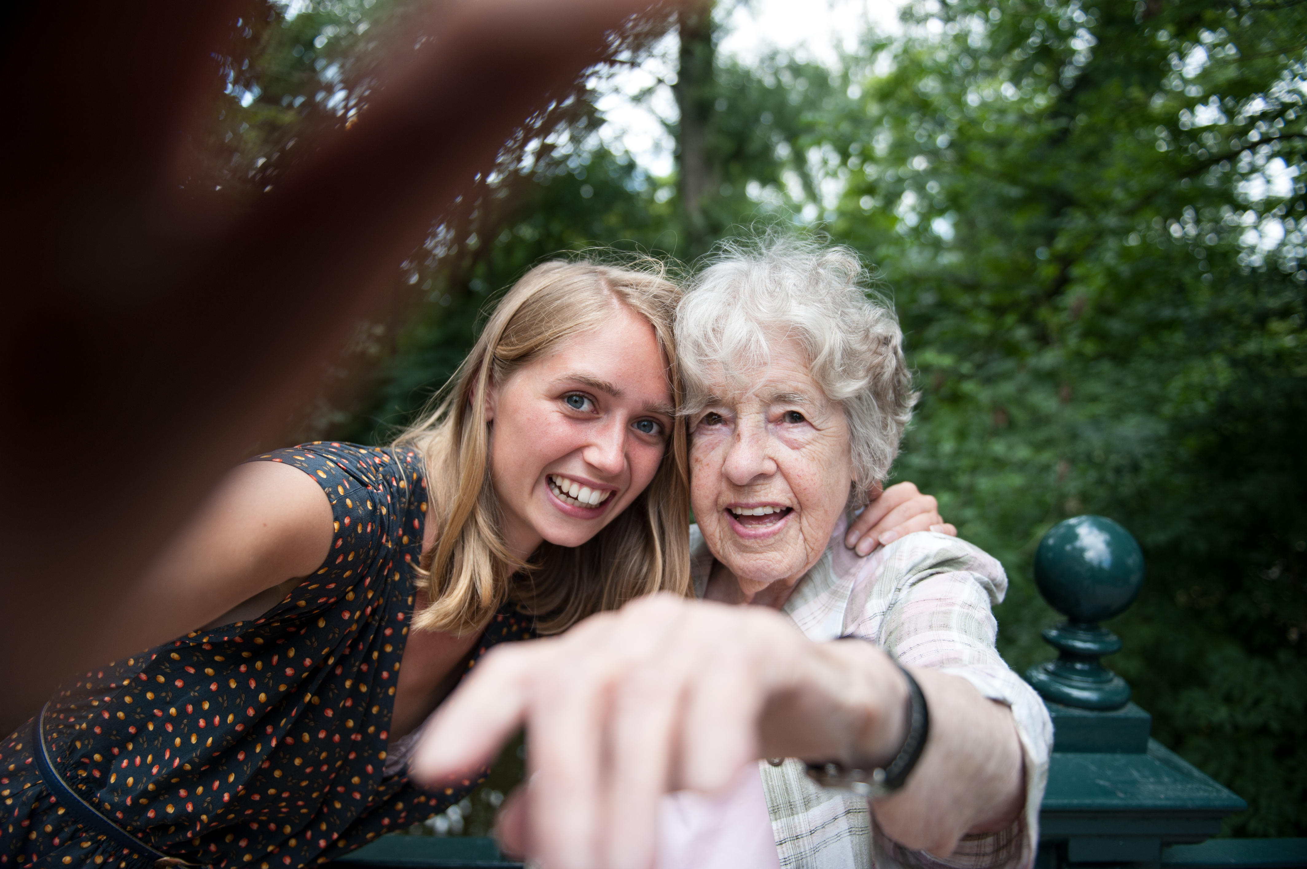 Senior (98) lady and young woman making a selfie | Source: Getty Images