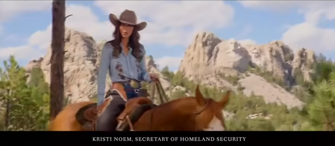 Kristin Noem wearing a cowboy hat rides a horse through a scenic landscape of trees and rocky mountains. | Source: YouTube/KOTATerritoryNews