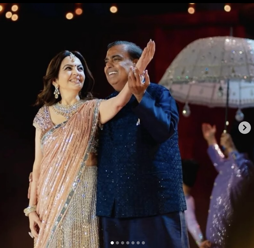Nita and Mukesh Ambani during the Mela Rouge Sangeet Ceremony at Anant Ambani and Radhika Merchant's pre-wedding weekend in Jamnagar, India in March 2024 | Source: instagram/_ishaambanipiramal