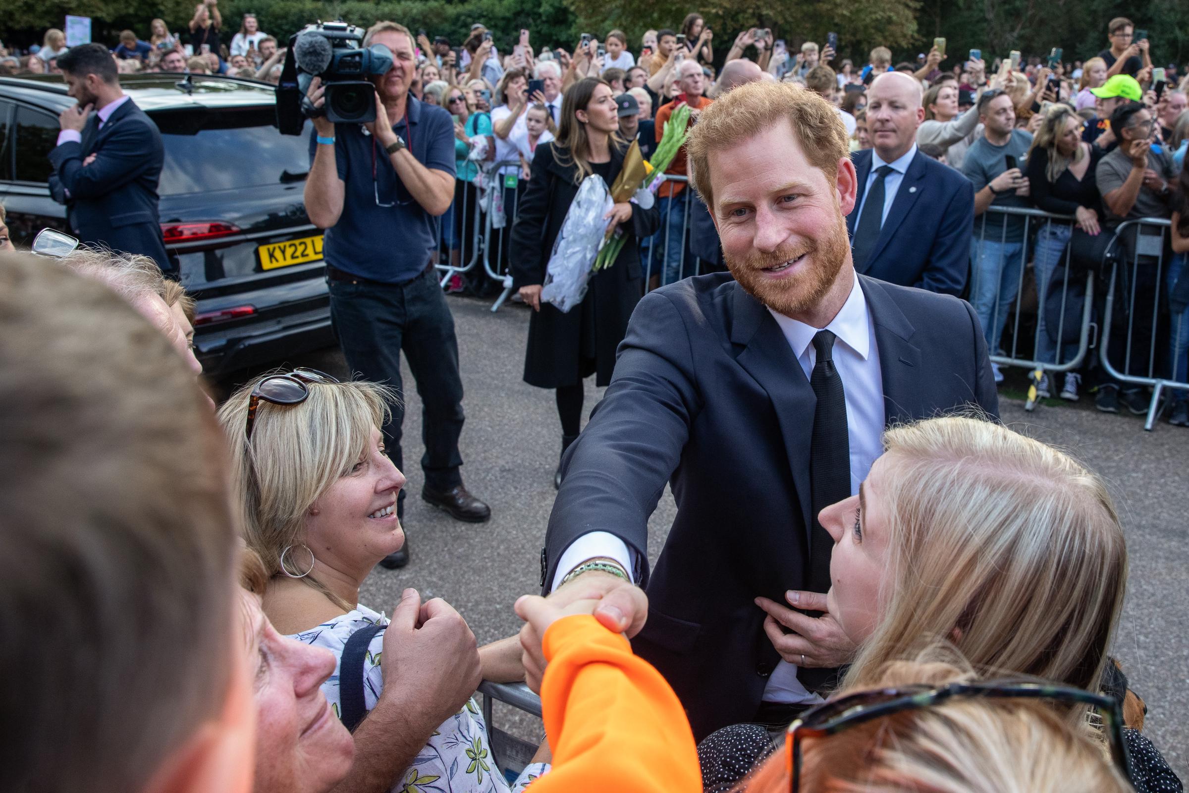 Prince Harry greets well-wishers on the Long Walk outside Windsor Castle in Windsor, England on September 10, 2022 | Source: Getty Images