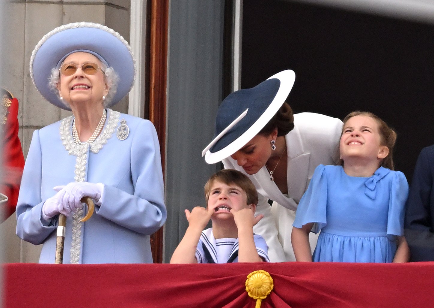 Queen Elizabeth II, Prince Louis, Catherine, Duchess of Cambridge an Princess Charlotte during Trooping the Colour on June 02, 2022 in London, England | Source: Getty Images 