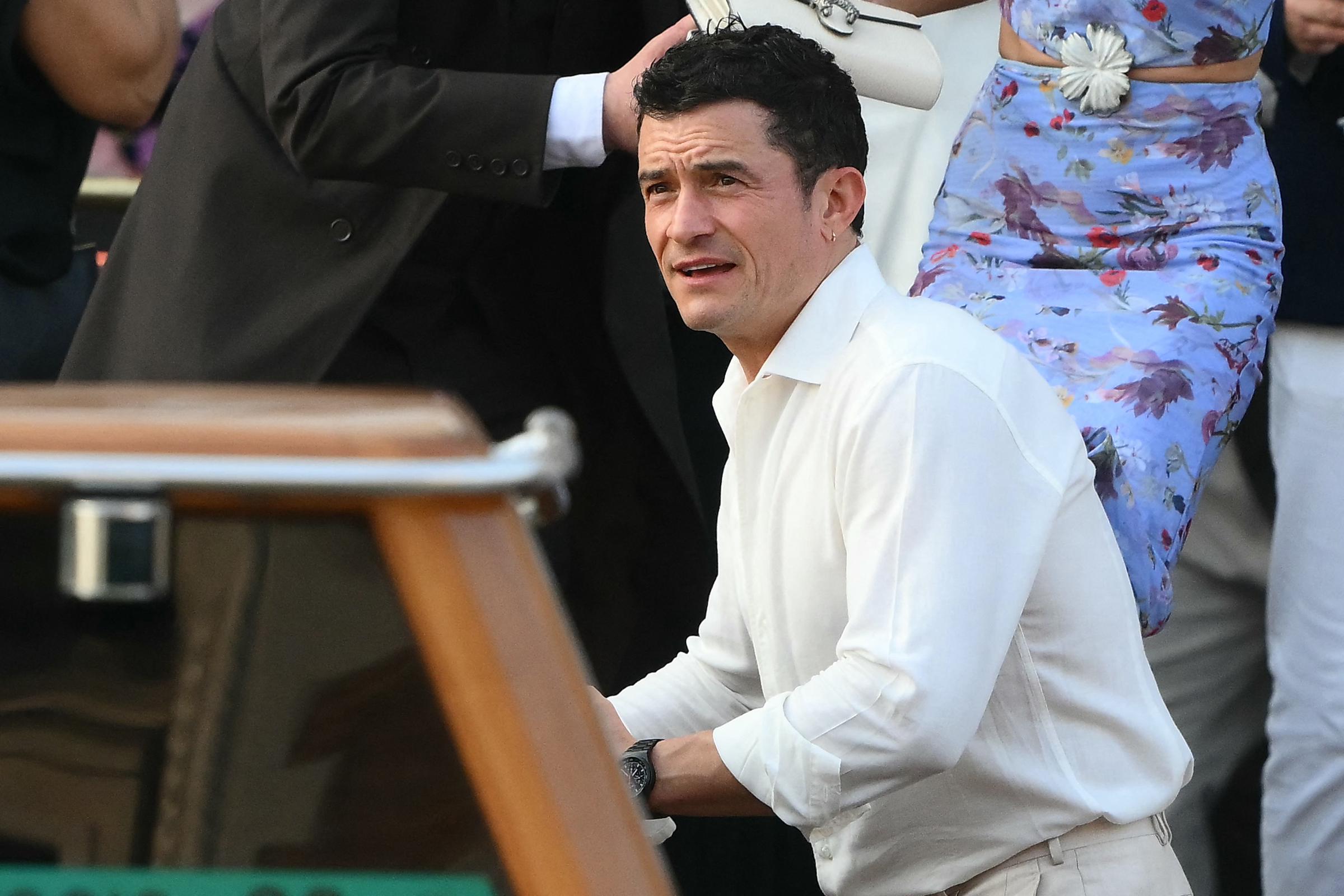 British actor Orlando Bloom and guests get on a taxi boat as they head to the hit wedding of the month in Venice.