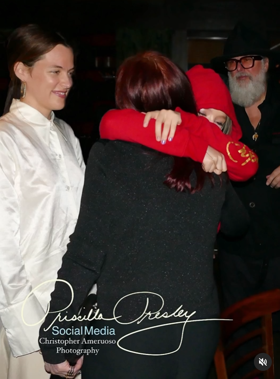 Harper Lockwood hugs her grandmother Priscilla Presley at the party, dated May 2024. | Source: Instagram/priscillapresley