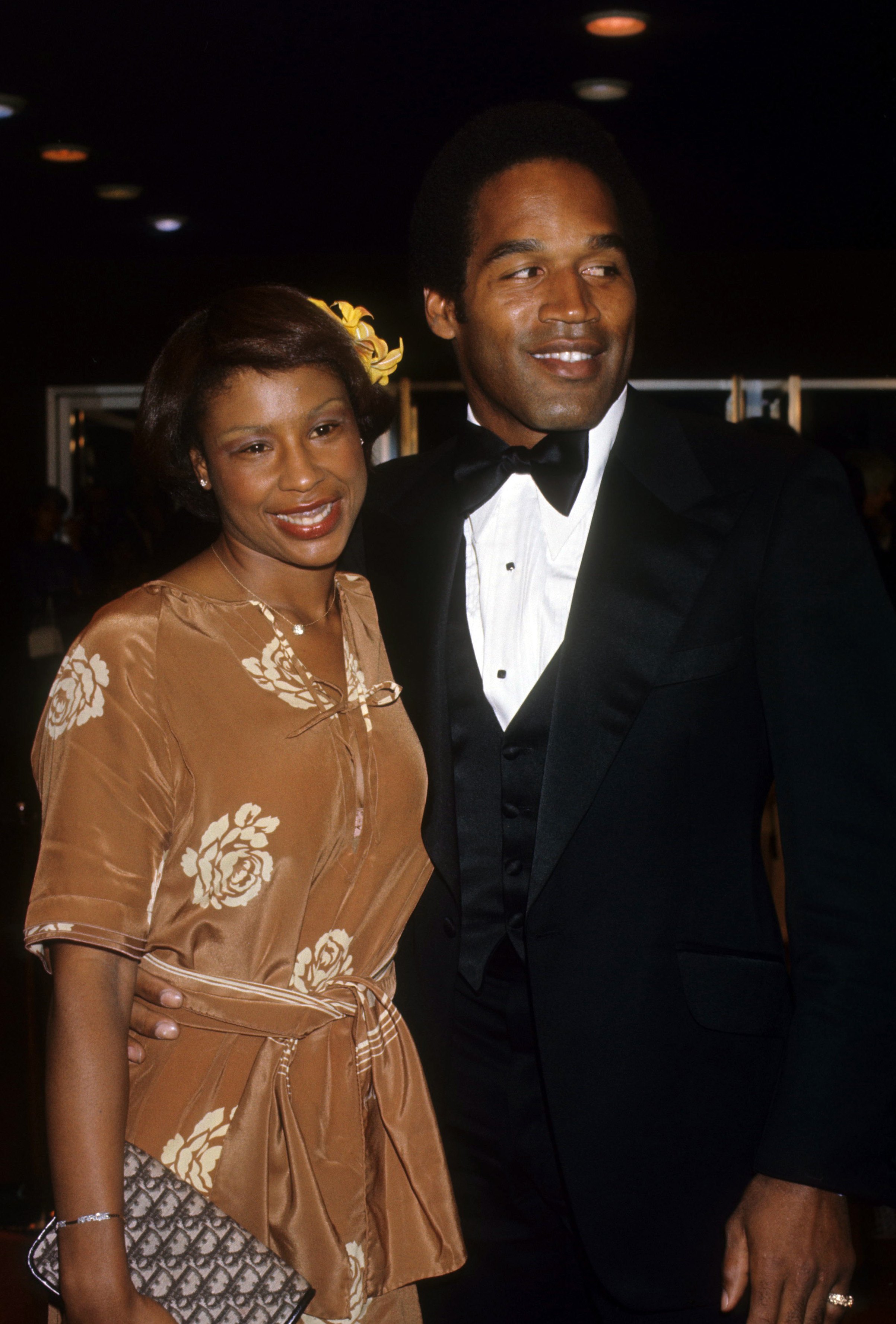 OJ Simpson and Marguerite Whitley at a movie premiere in 1977, in Los Angeles, California | Source: Getty Images
