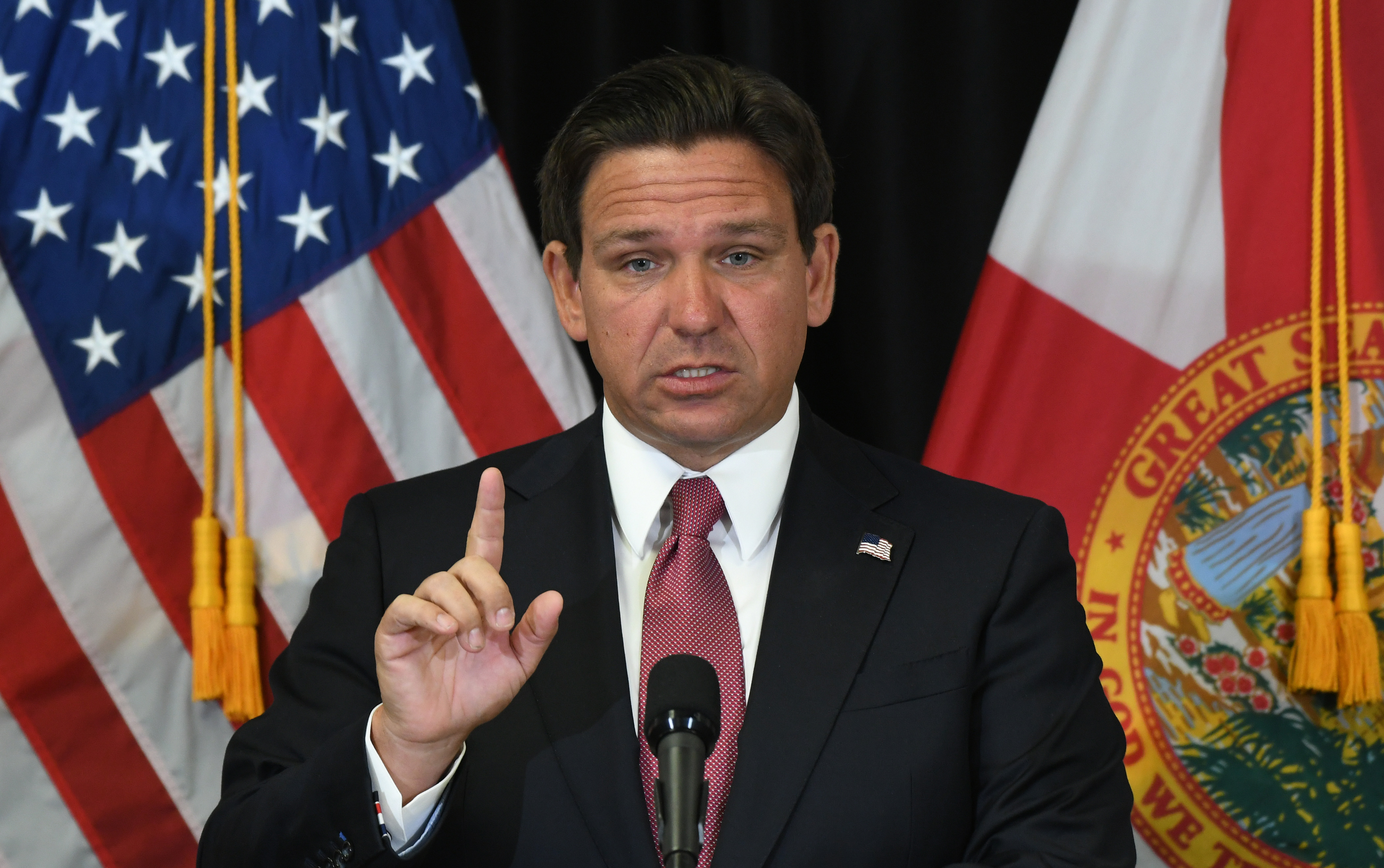 Florida Governor Ron DeSantis speaking during a press conference in Sanford, Florida on April 8, 2024 | Source: Getty Images