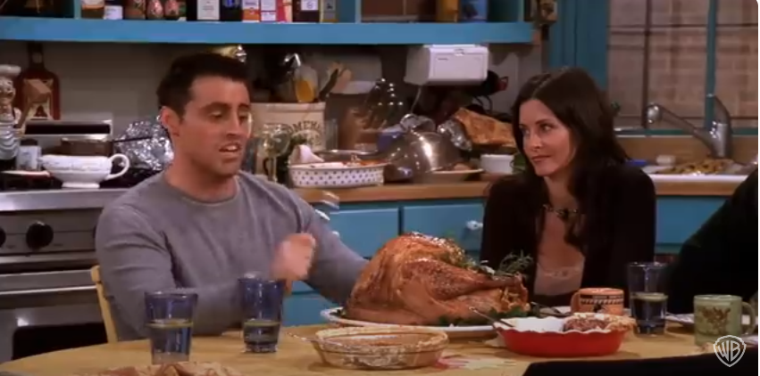 Matt LeBlanc as Joey on the set of "Friends" eating turkey | Source: YouTube/@warnerbrostv