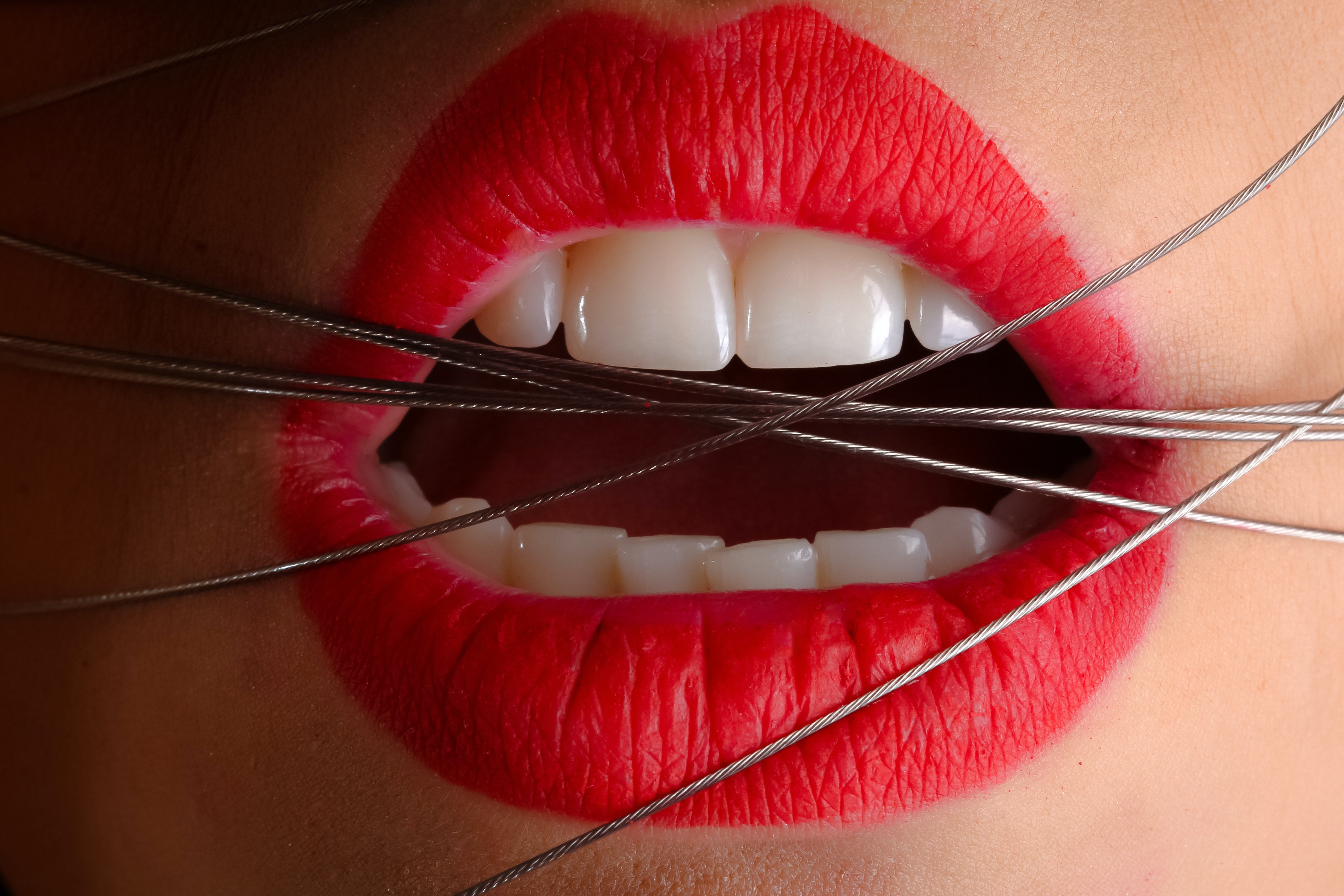 An image of a lady's teeth | Photo: Pixabay