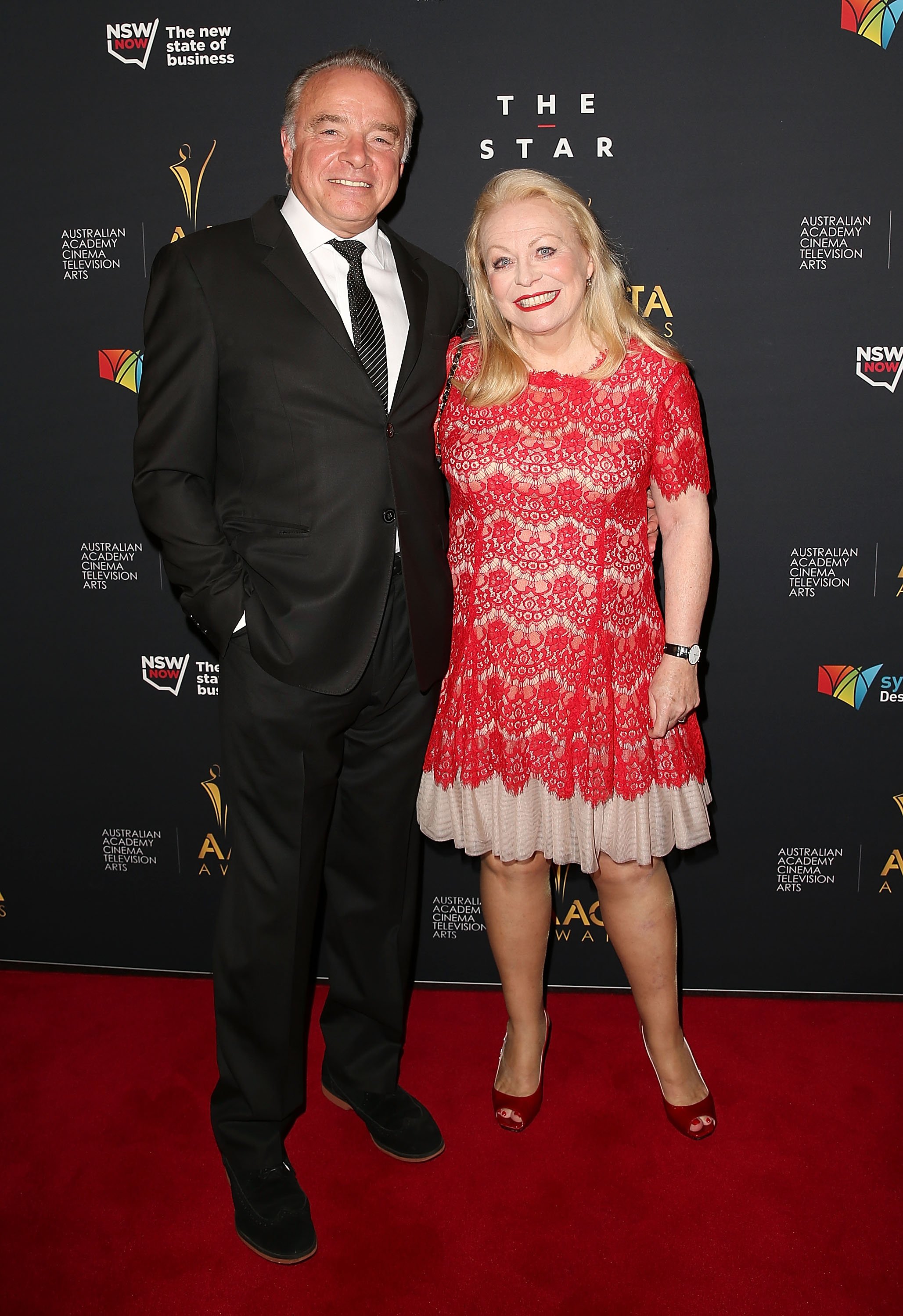Jacki Weaver and Sean Taylor pose on the red carpet at the 3rd Annual AACTA Awards Luncheon at The Star on January 28, 2014, in Sydney, Australia | Source: Getty Images