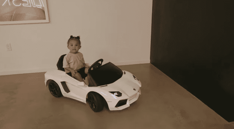 Stormi in her Lamborghini | Source: YouTube/Kylie Jenner