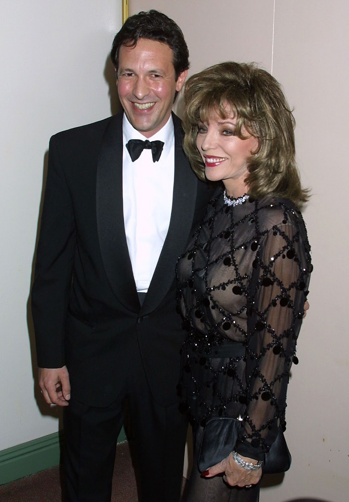 On April 16, 2001, Joan Collins attended the 12th Annual GLAAD Media Awards with Percy Gibson. Their relationship would soon grow into a lasting marriage, defying public skepticism over their age difference. | Source: Getty Images