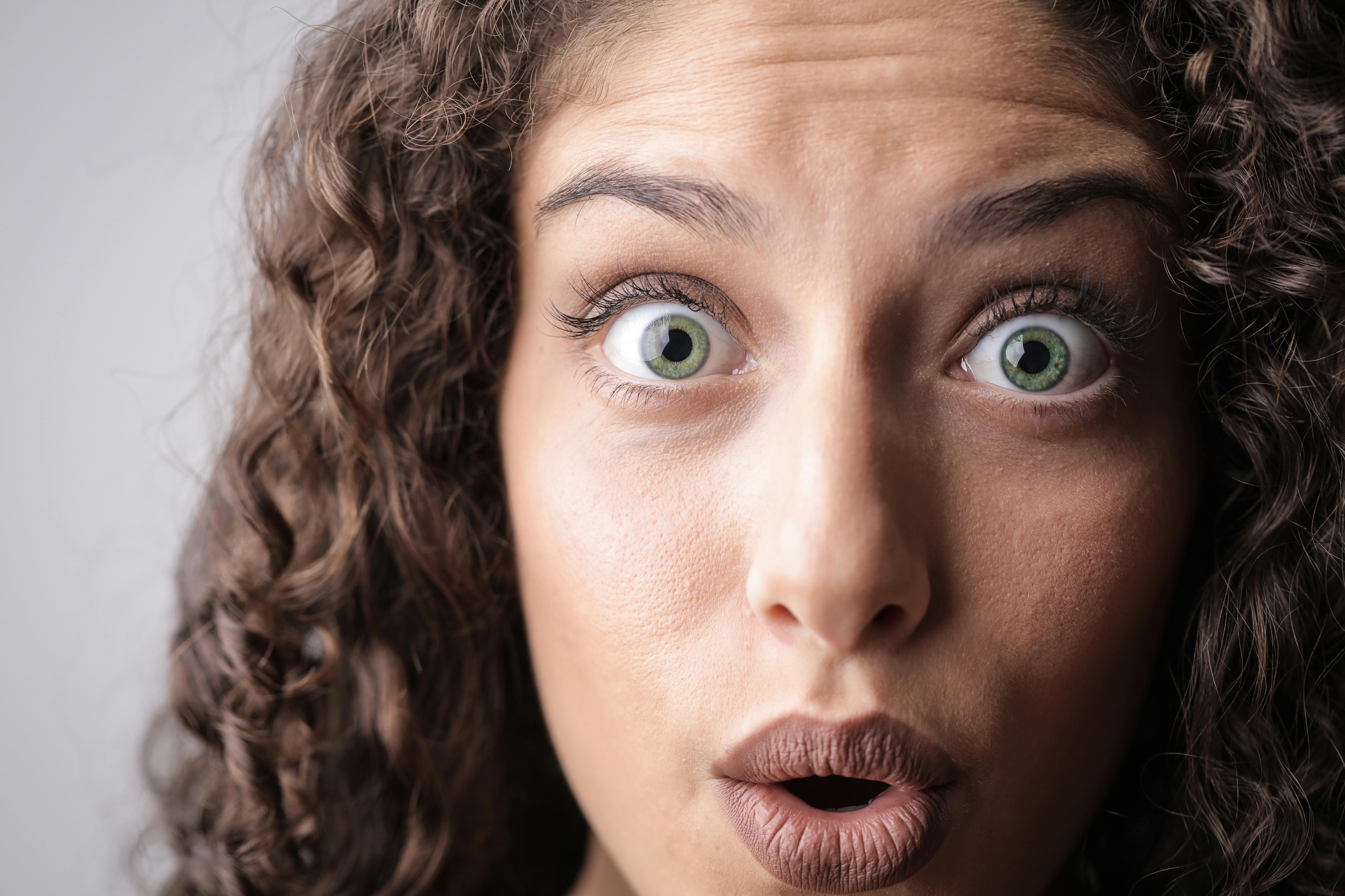 Shocked woman with green eyes | Source: Pexels