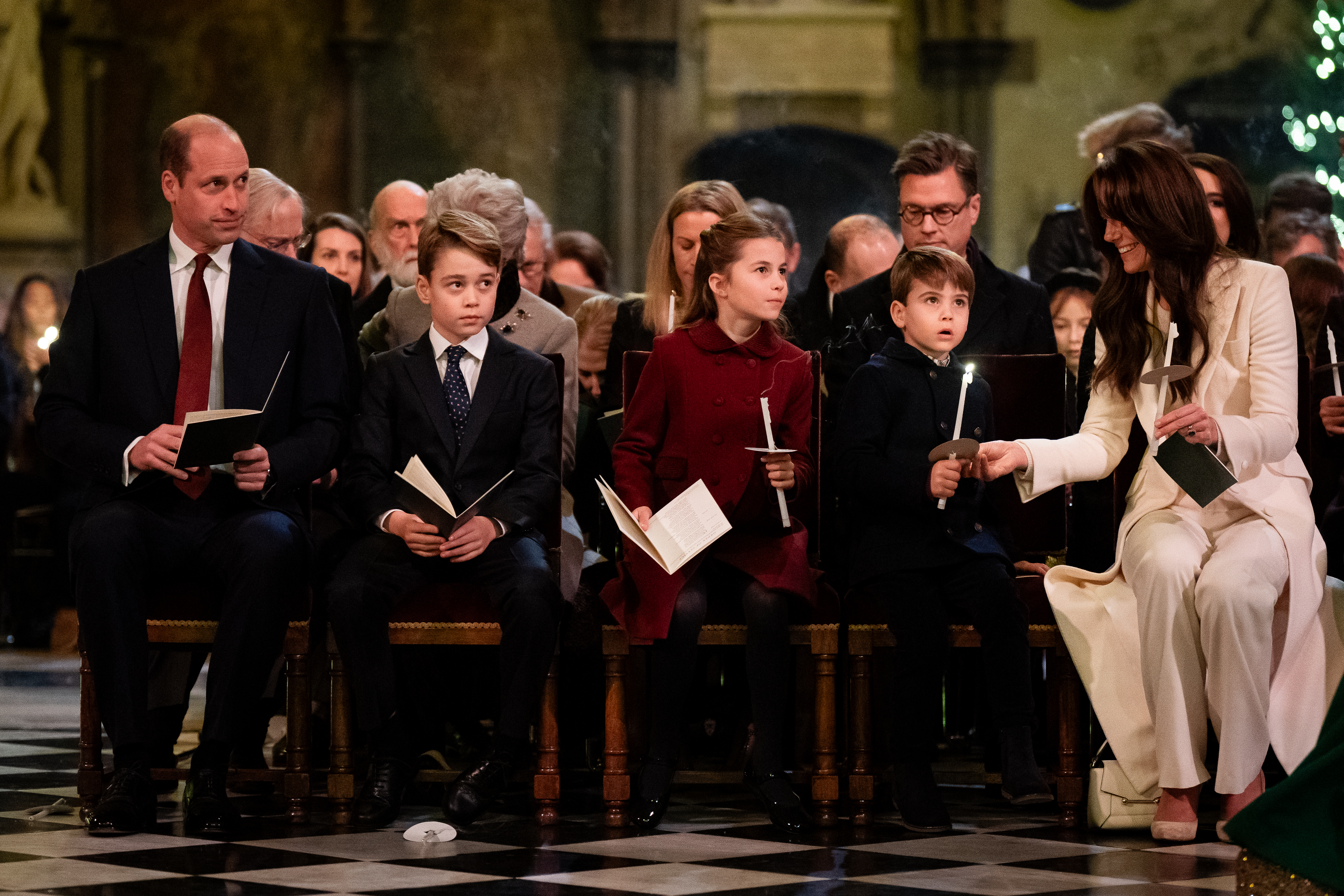 Princess Catherine and Prince William with their children Prince George, Princess Charlotte, and Prince Louis at the Royal Carols - Together At Christmas service at Westminster Abbey on December 8, 2023 in London, England | Source: Getty Images