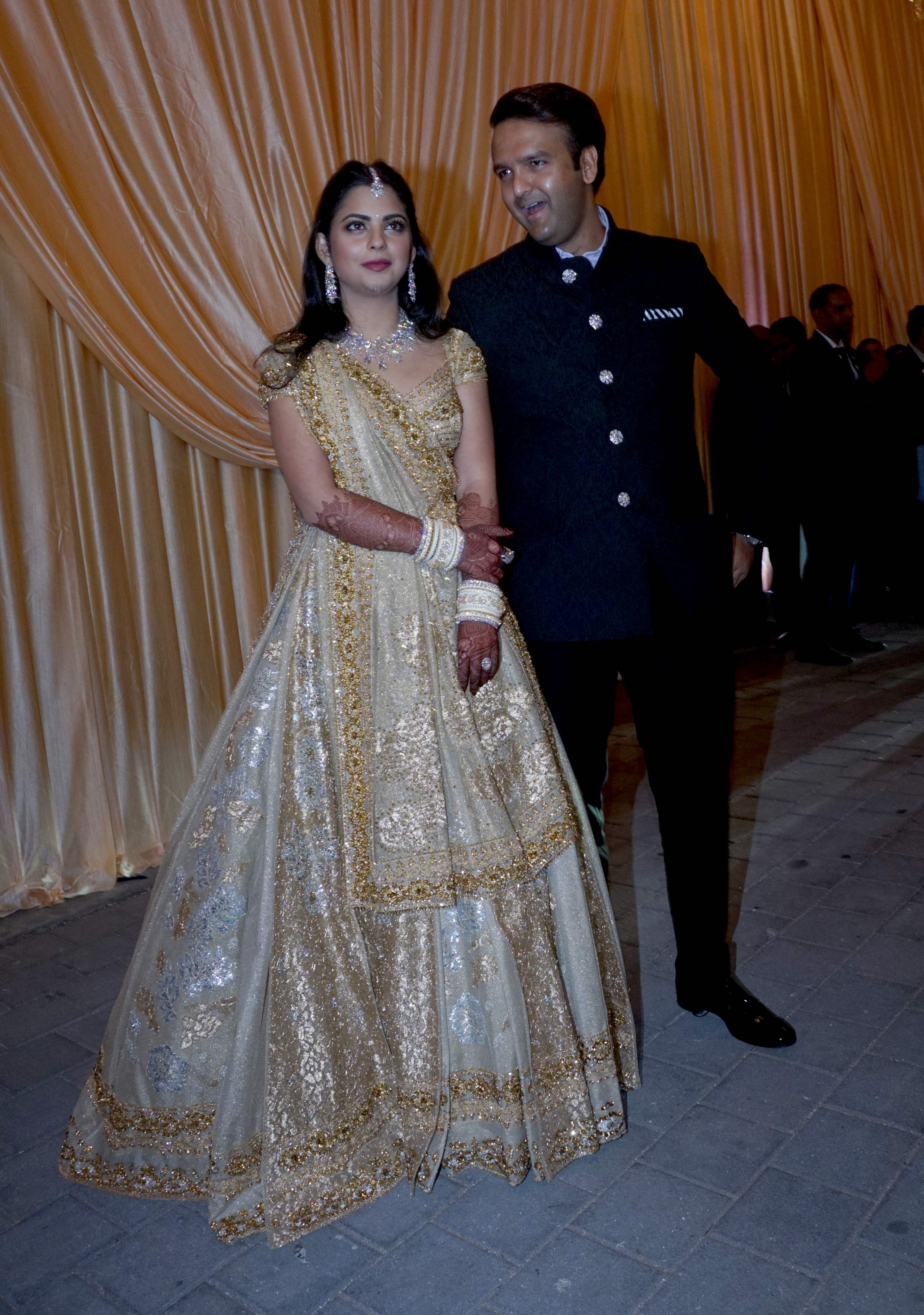 Isha Ambani and Anand Piramal during their wedding reception in Mumbai on December 14, 2018 | Source: Getty Images