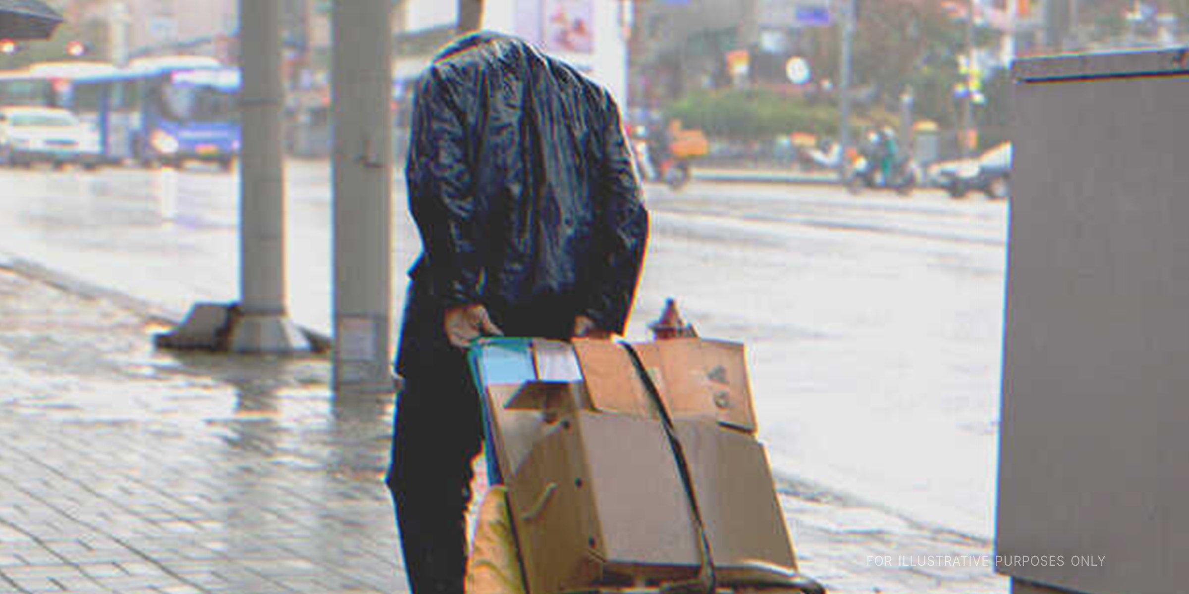 Homeless Man Pulling A Cardboard Cart | Source: Shutterstock